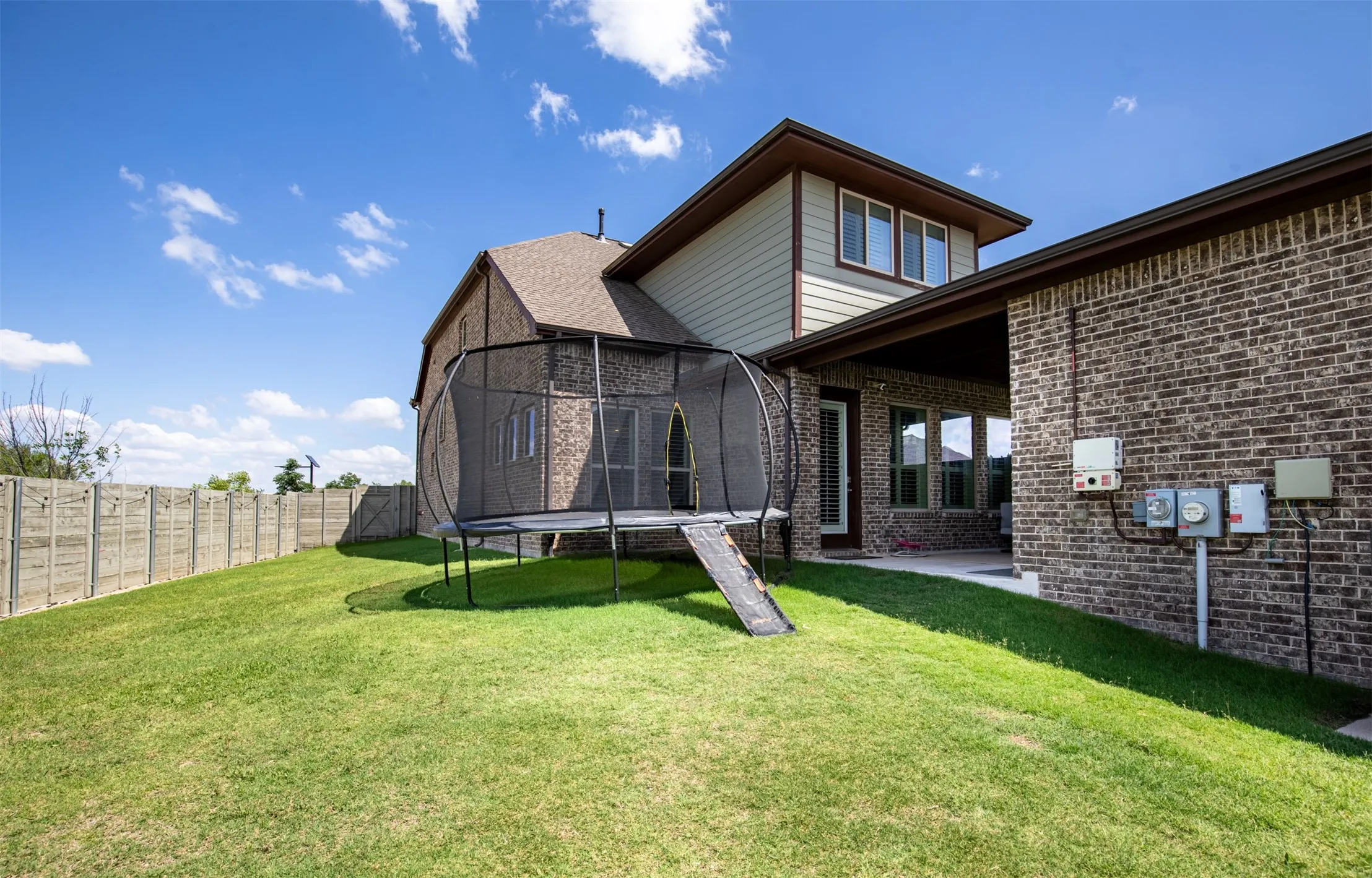 This exceptionally large, elevated yard provides ample privacy.