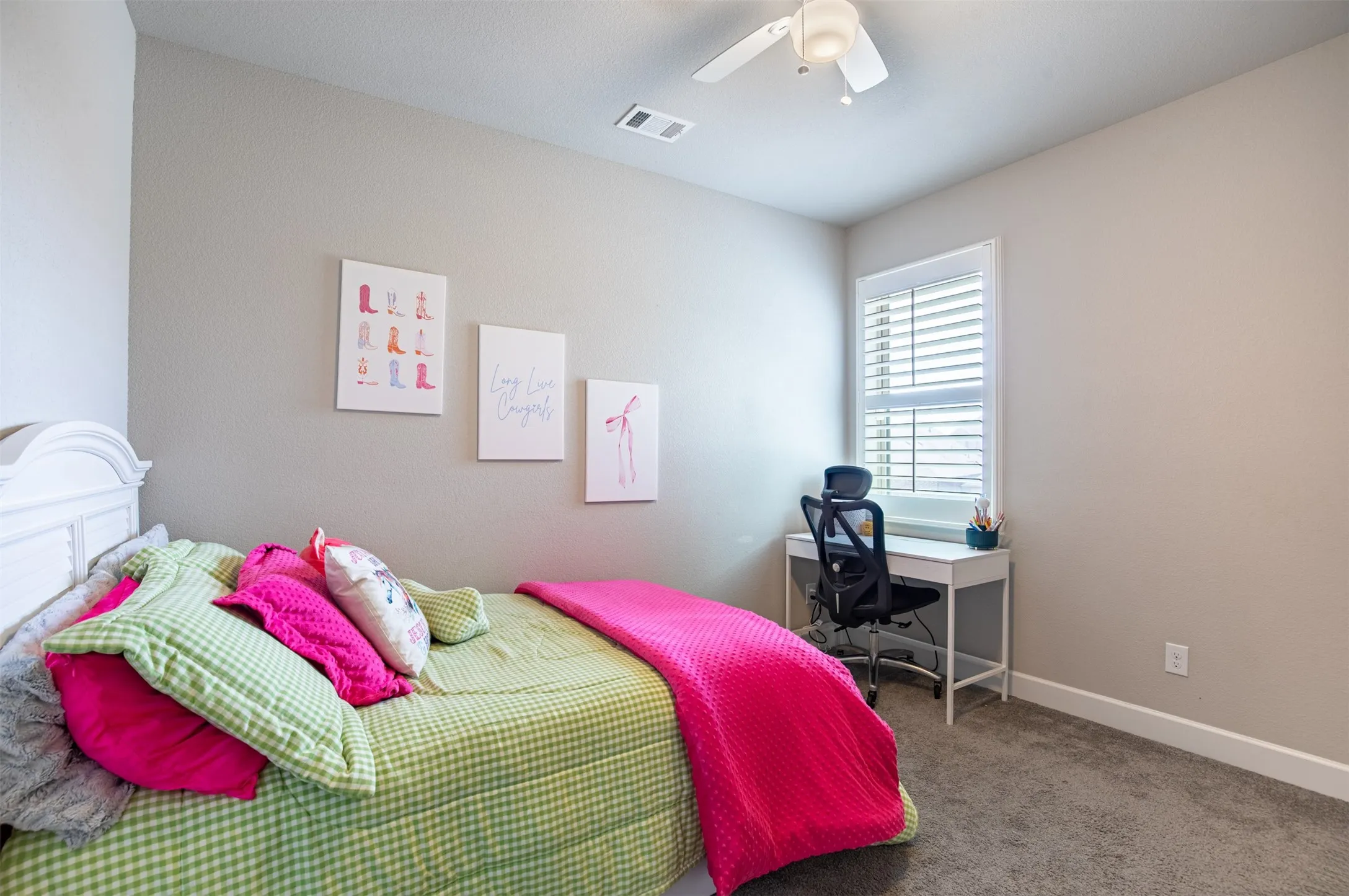 Secondary bedroom with door leading to secondary bathroom.
