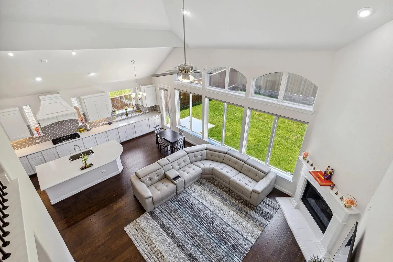 Vaulted ceilings in this open-concept living space with a gourmet kitchen