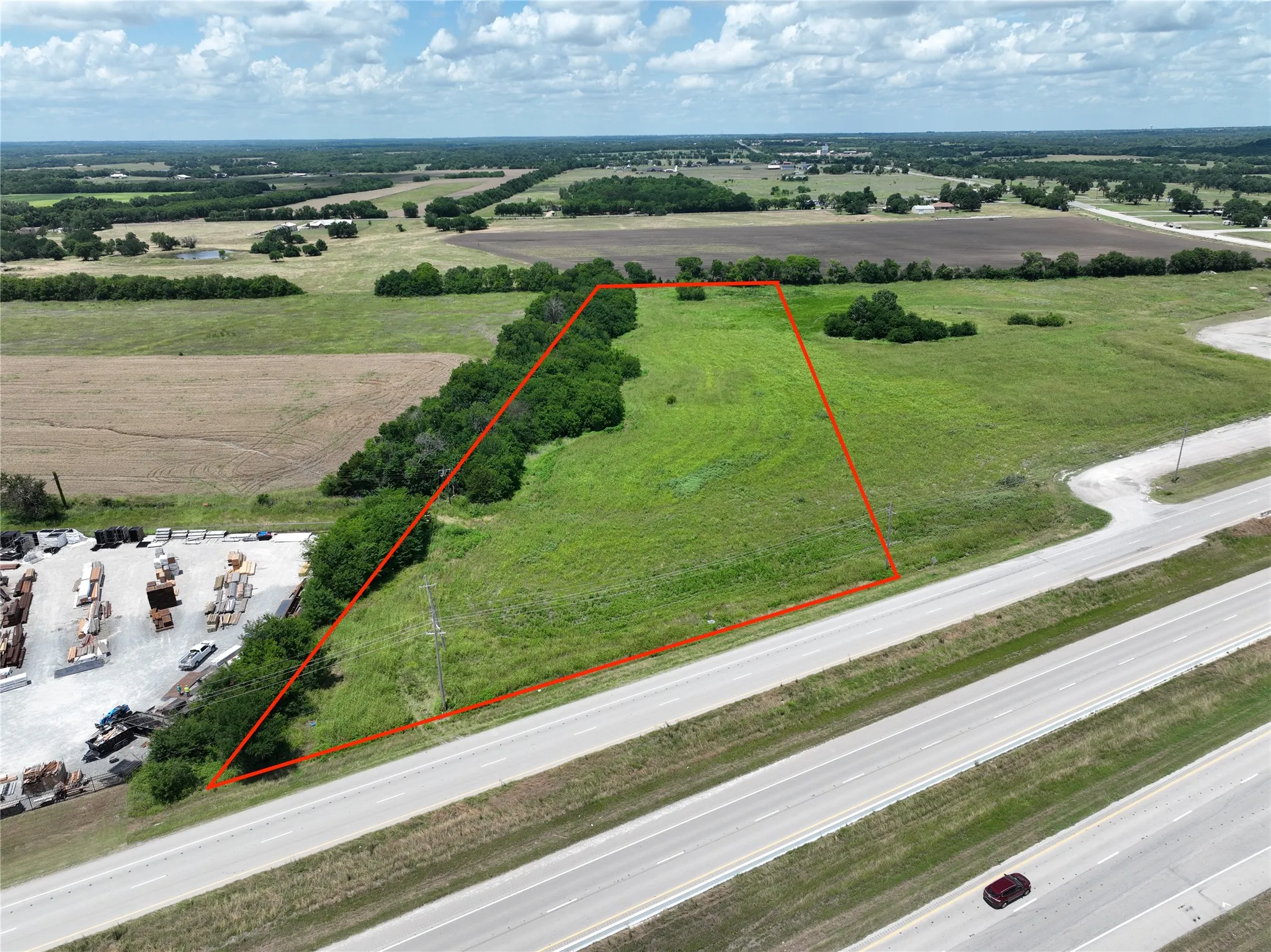 Expansive green acreage with highway frontage