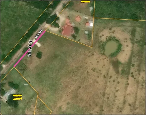 Illustrating property boundaries, showing dimensions on County Road frontage