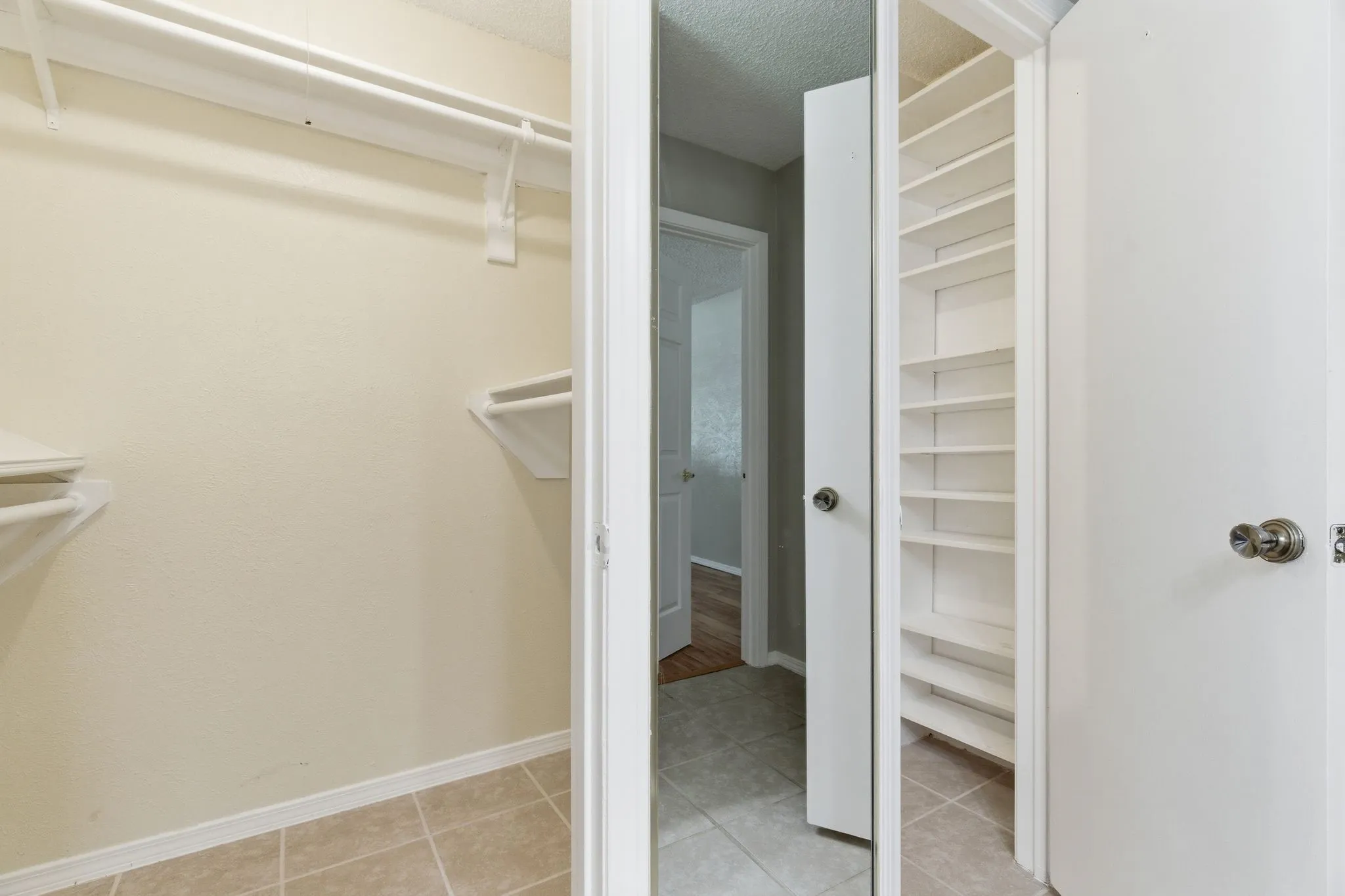 Generous closet space with built-in shelving