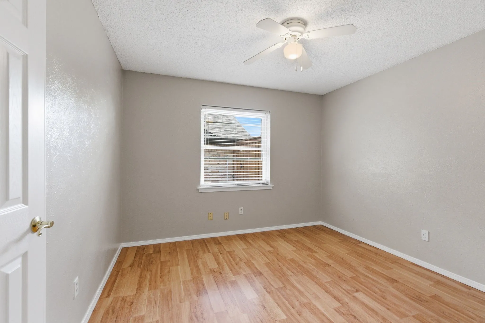 Comfortable secondary bedroom ideal for family, guests, or a home office