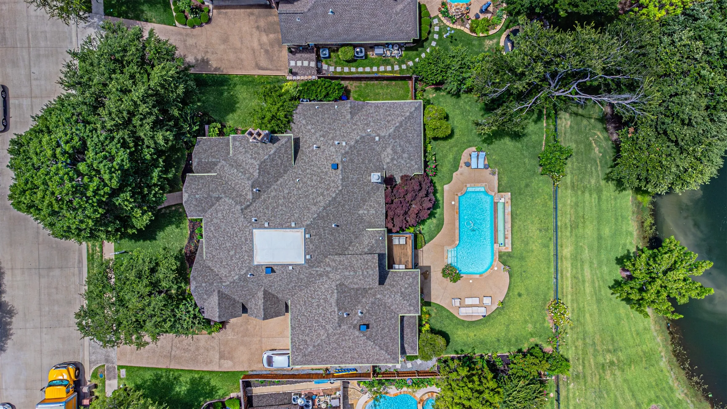 Expansive residential property featuring a large, multi-gabled roofline