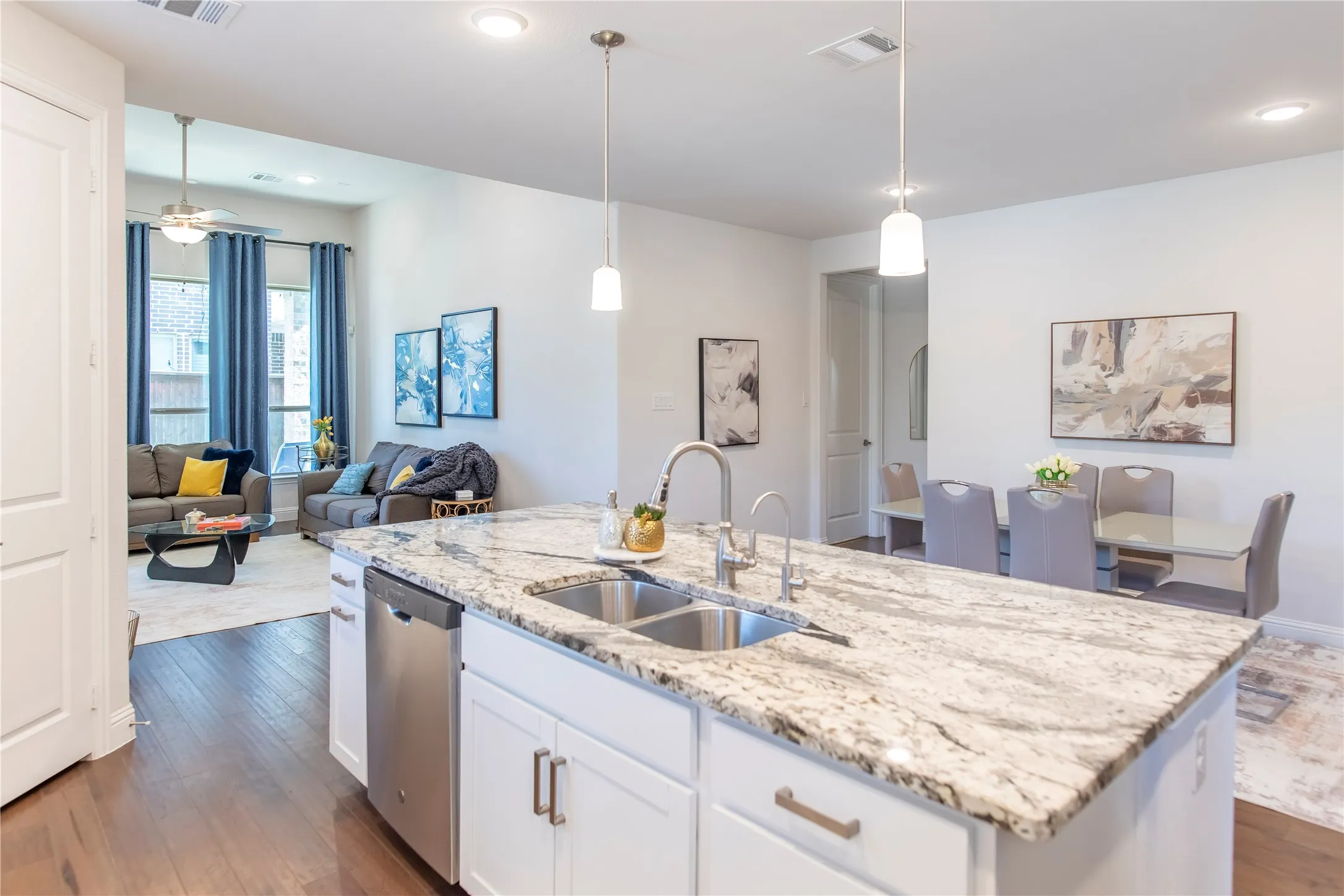 Open floor plan where kitchen, dining and living all come together
