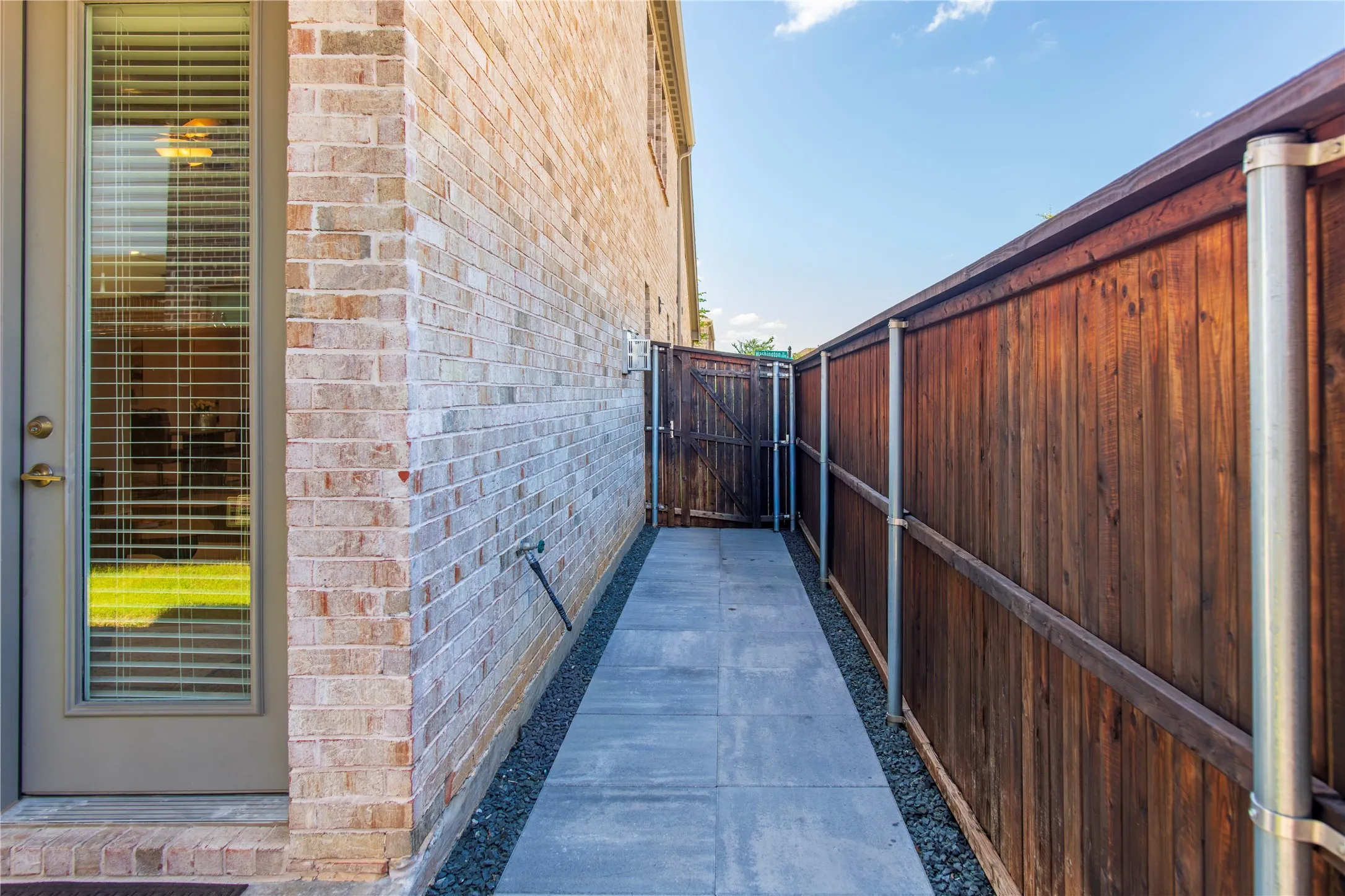 side of home with gravel paver updates