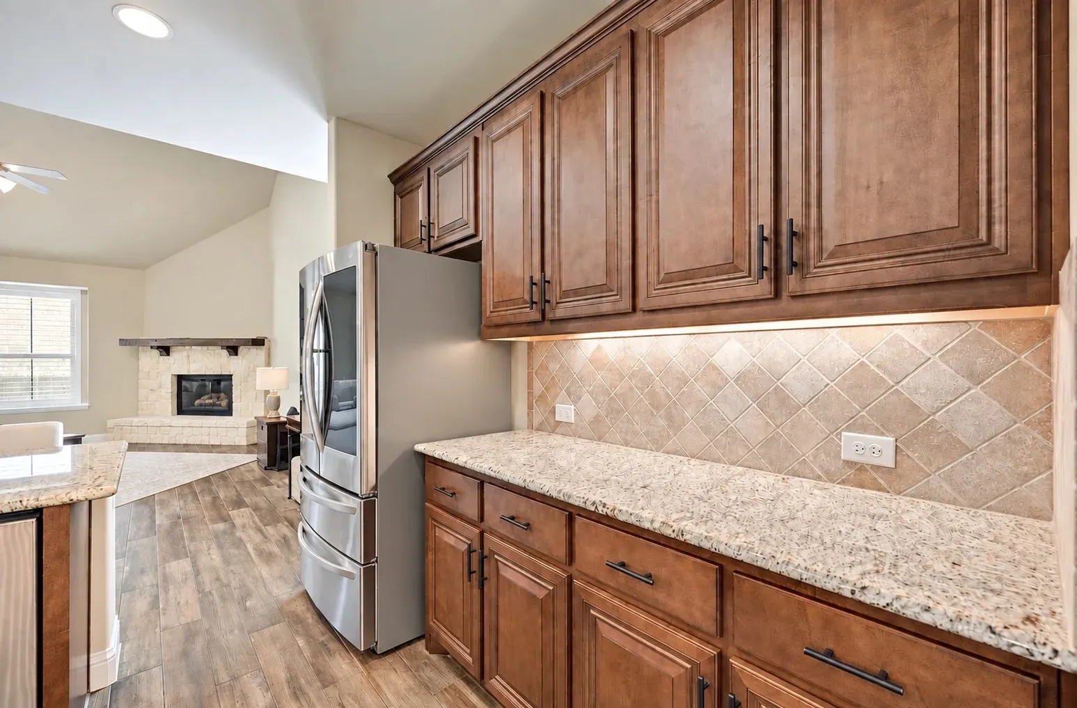 Kitchen Partial View of More Counter and Cabinet Space - and the LG Thin Q Door in Door Refrigerator to Remain
