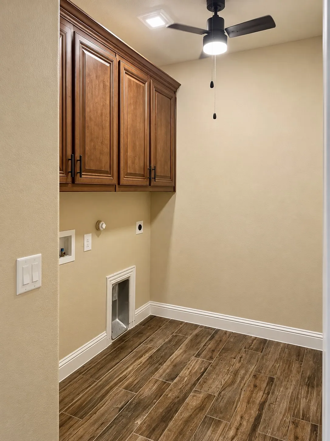 Nice Size Laundry Room with cabinetry