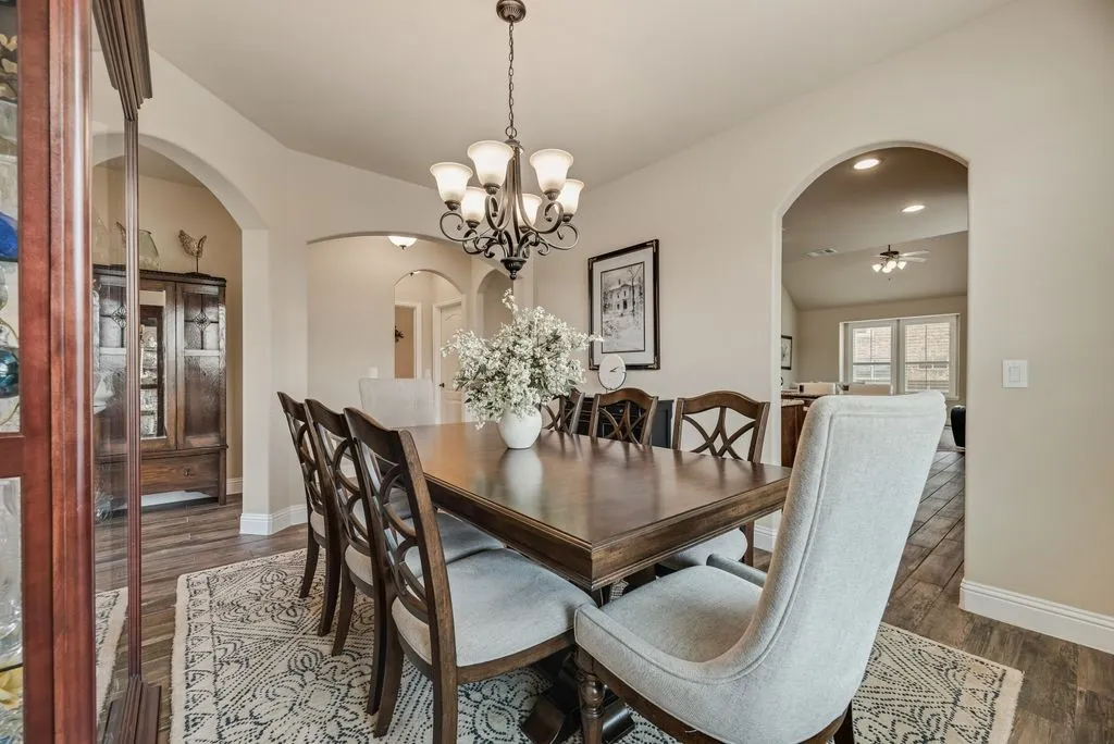 Dining Area View 2 Arched opening into Dining from Entry Hall, access to Kitchen from Dining