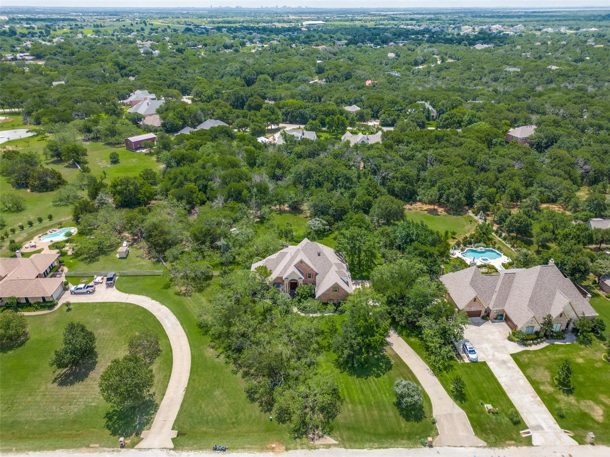 341 Onyx is the midldle property and you can clearly see all of the trees on the property.  It does take a curve to the left in the back.