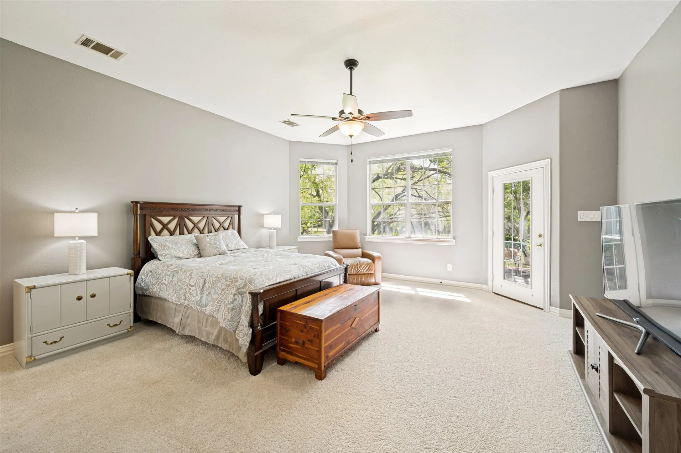 Primary bedroom has lots of space and room for a sitting area also