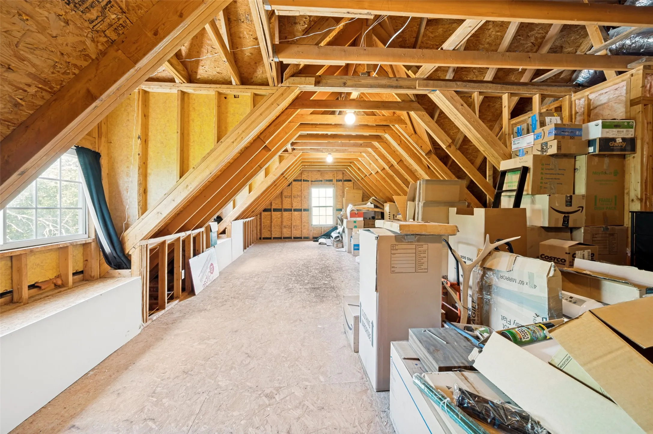 The hidden gem upstairs is this unfinished bonus room.  You must see to appreciate how large it is.  windows are in!