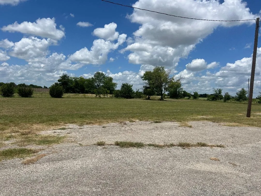 back acre of land - approx 1 acre to build more