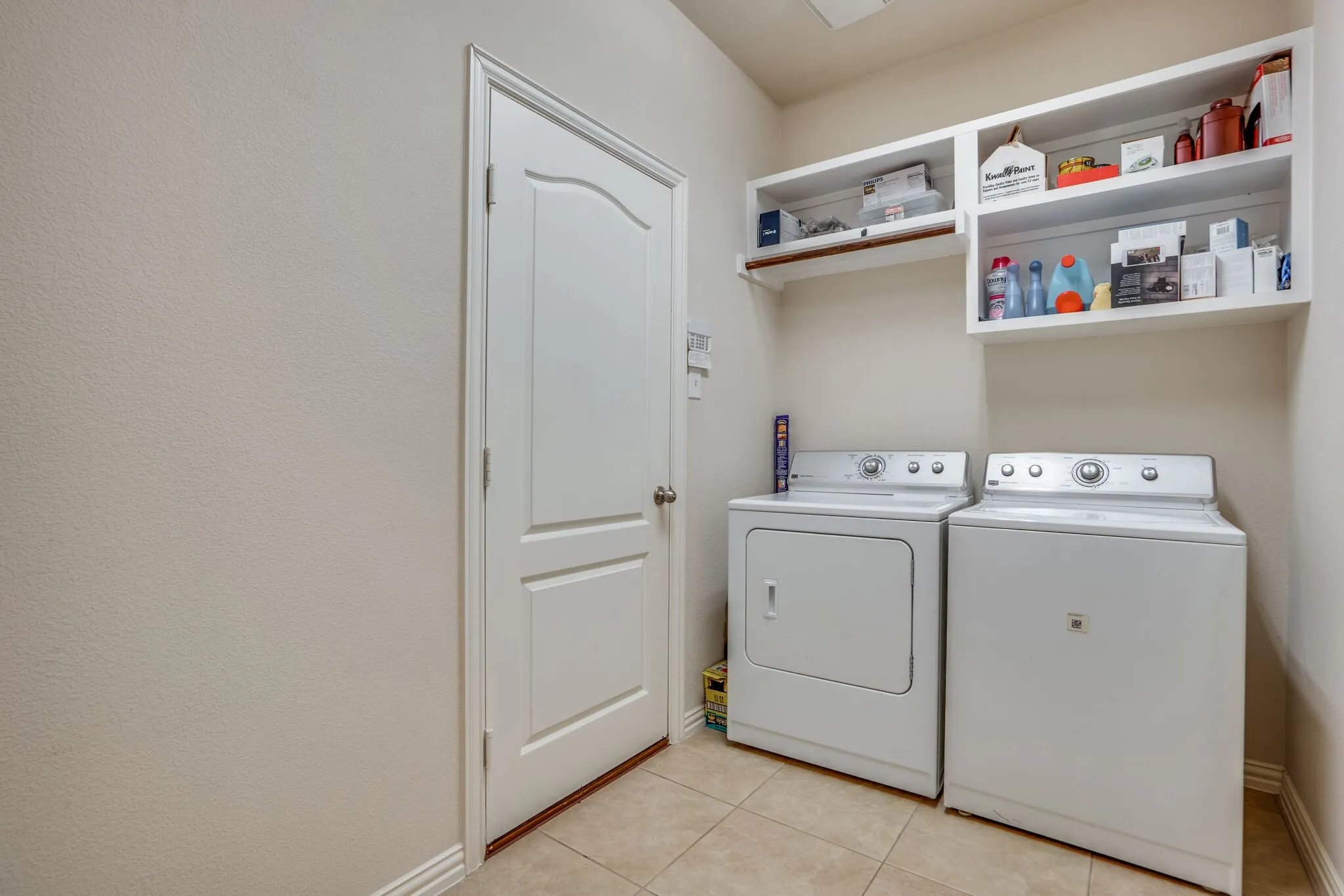 Utility Room features full size washer and Dryer