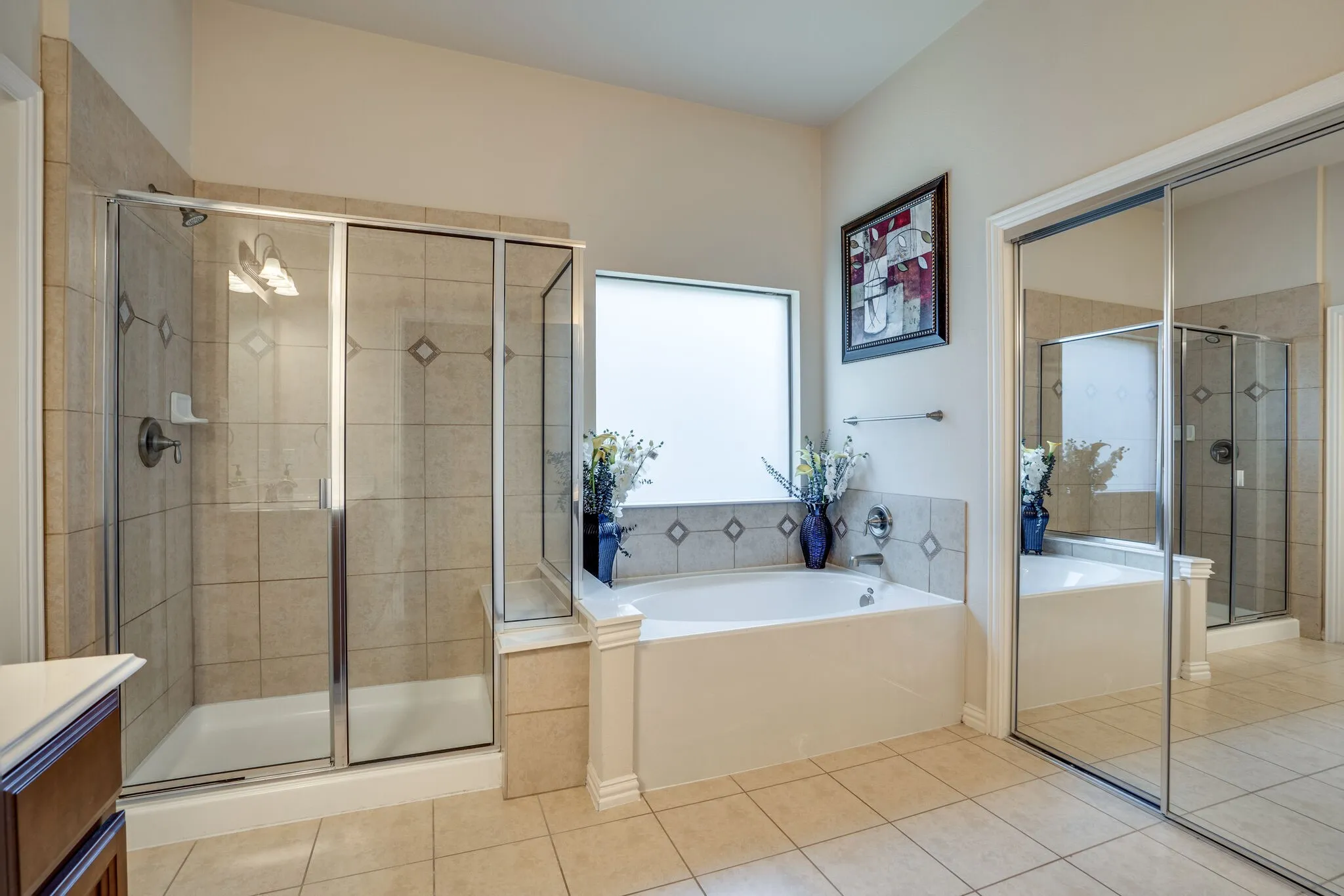Master Bathroom features large walk in shower and garden tub