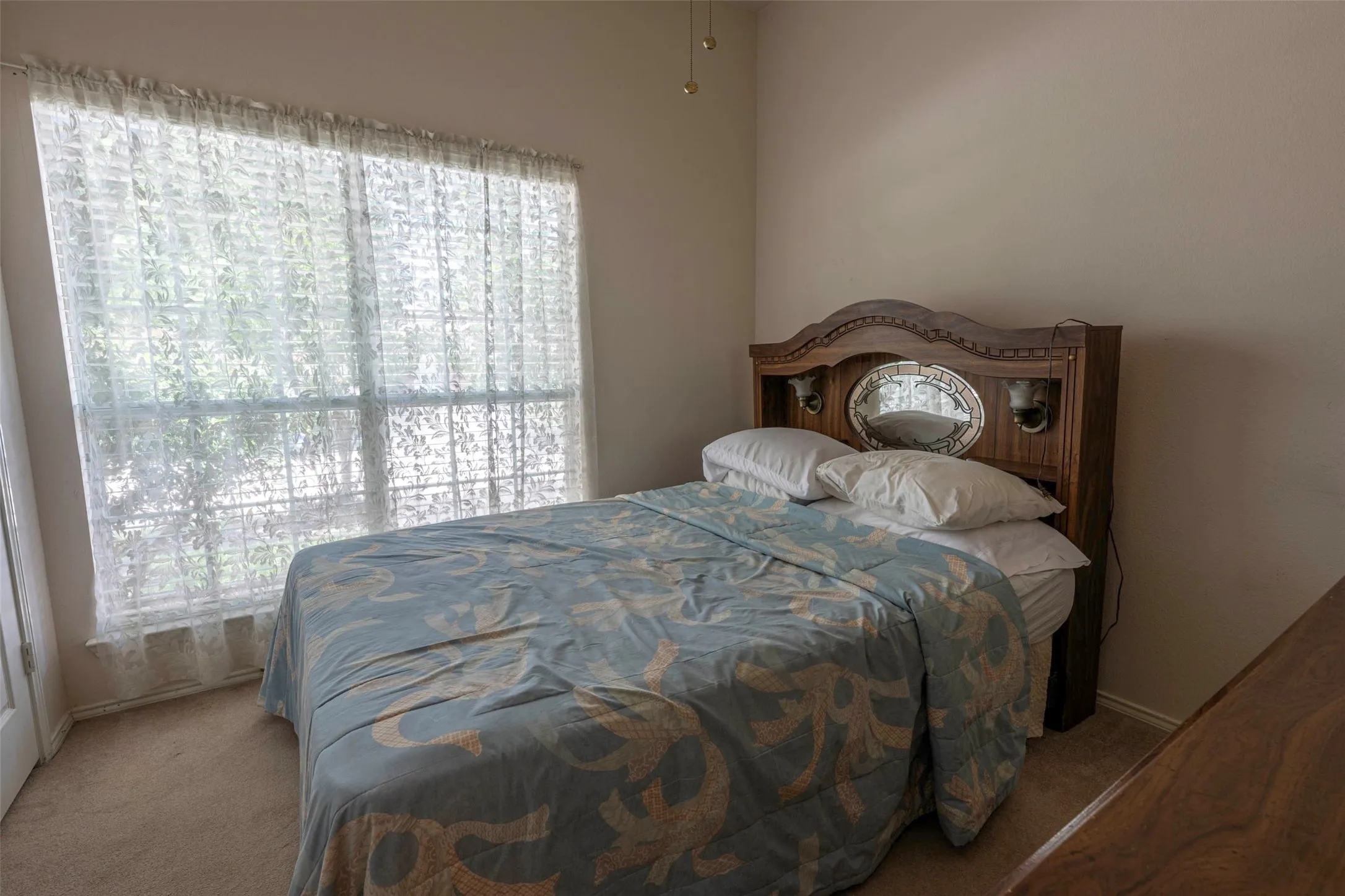 Spacious room featuring a large window