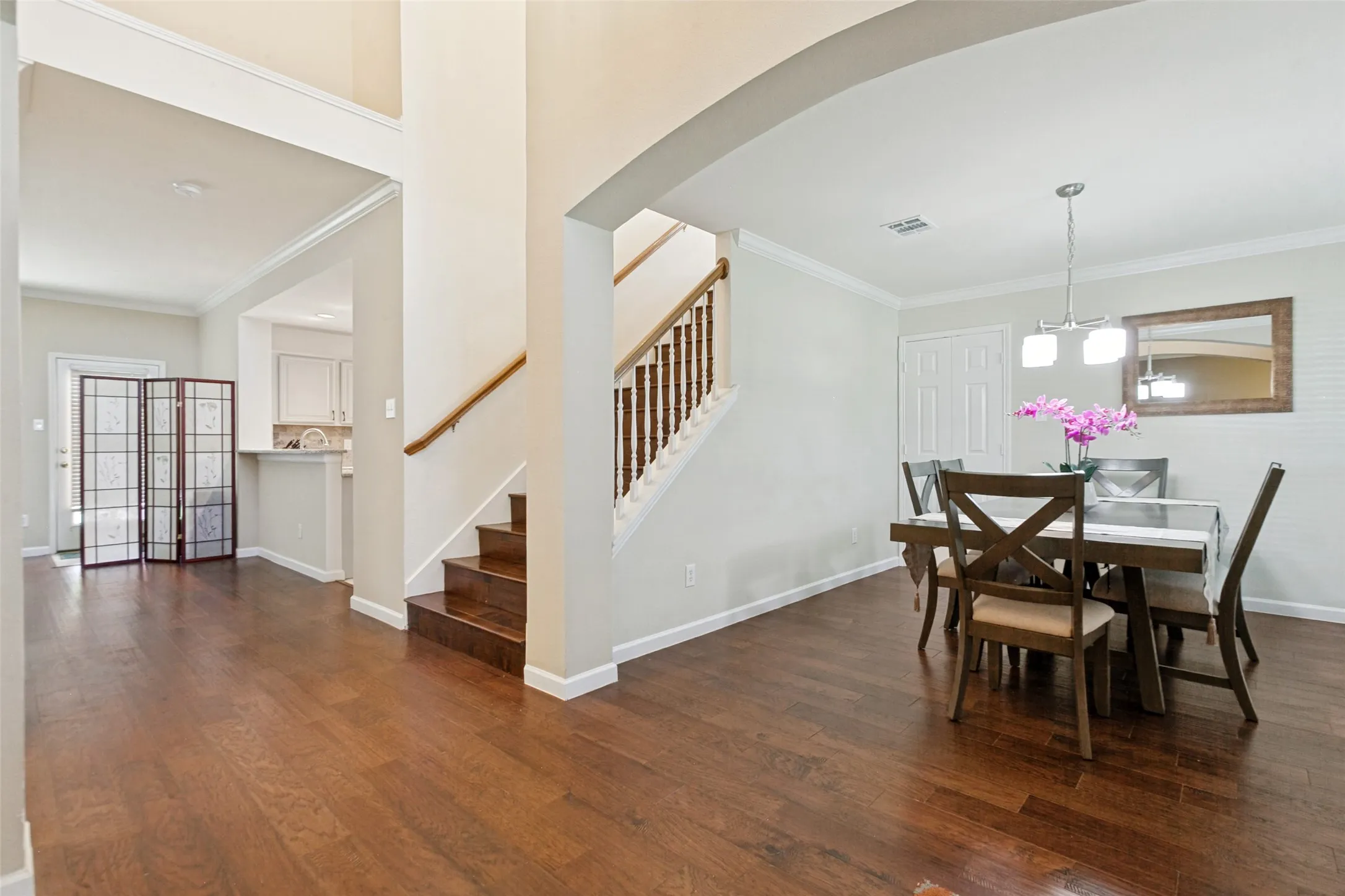 Warm engineered hardwood floors through out the house.
