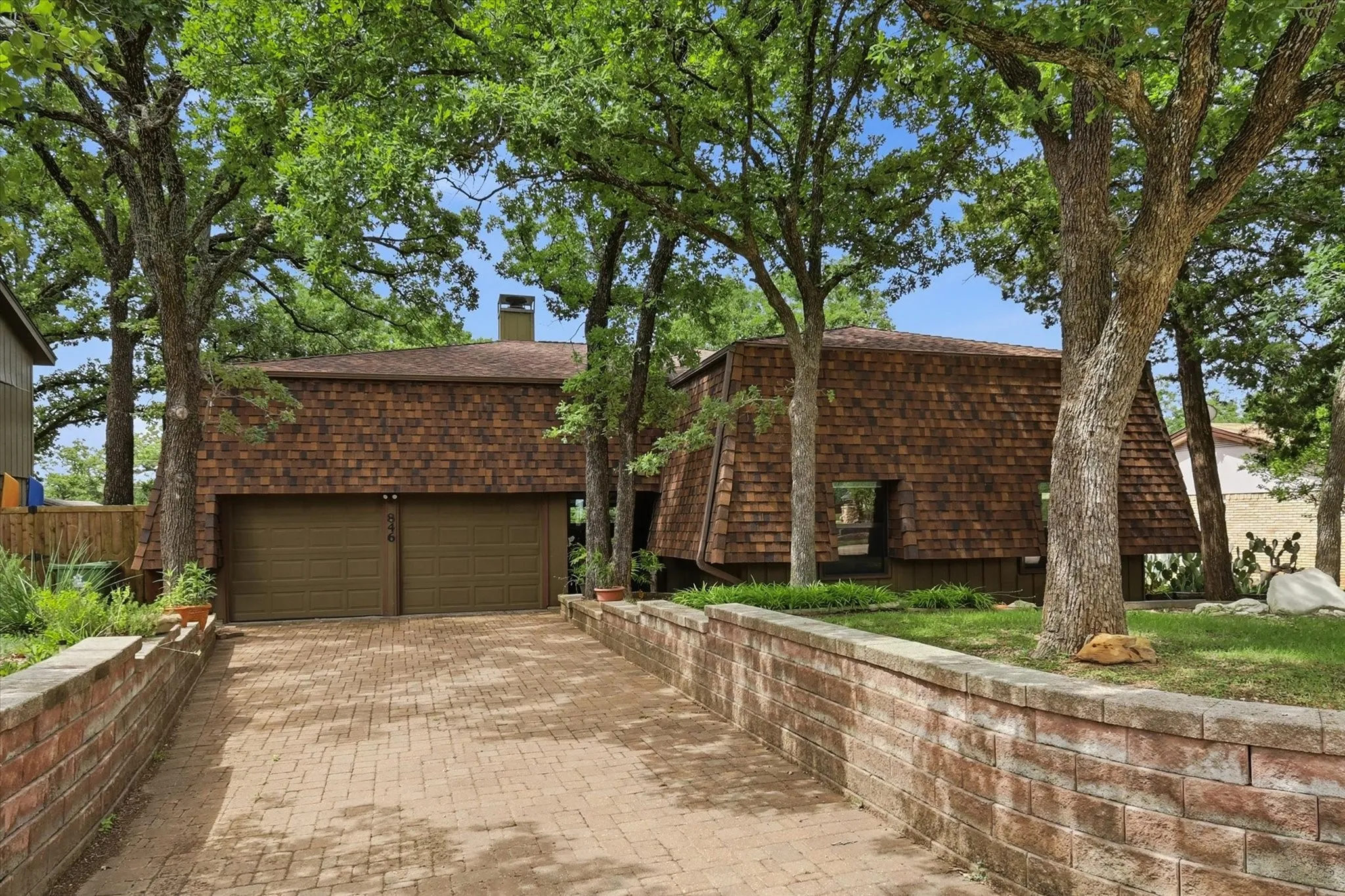 Long Brick Drive with Mature Trees