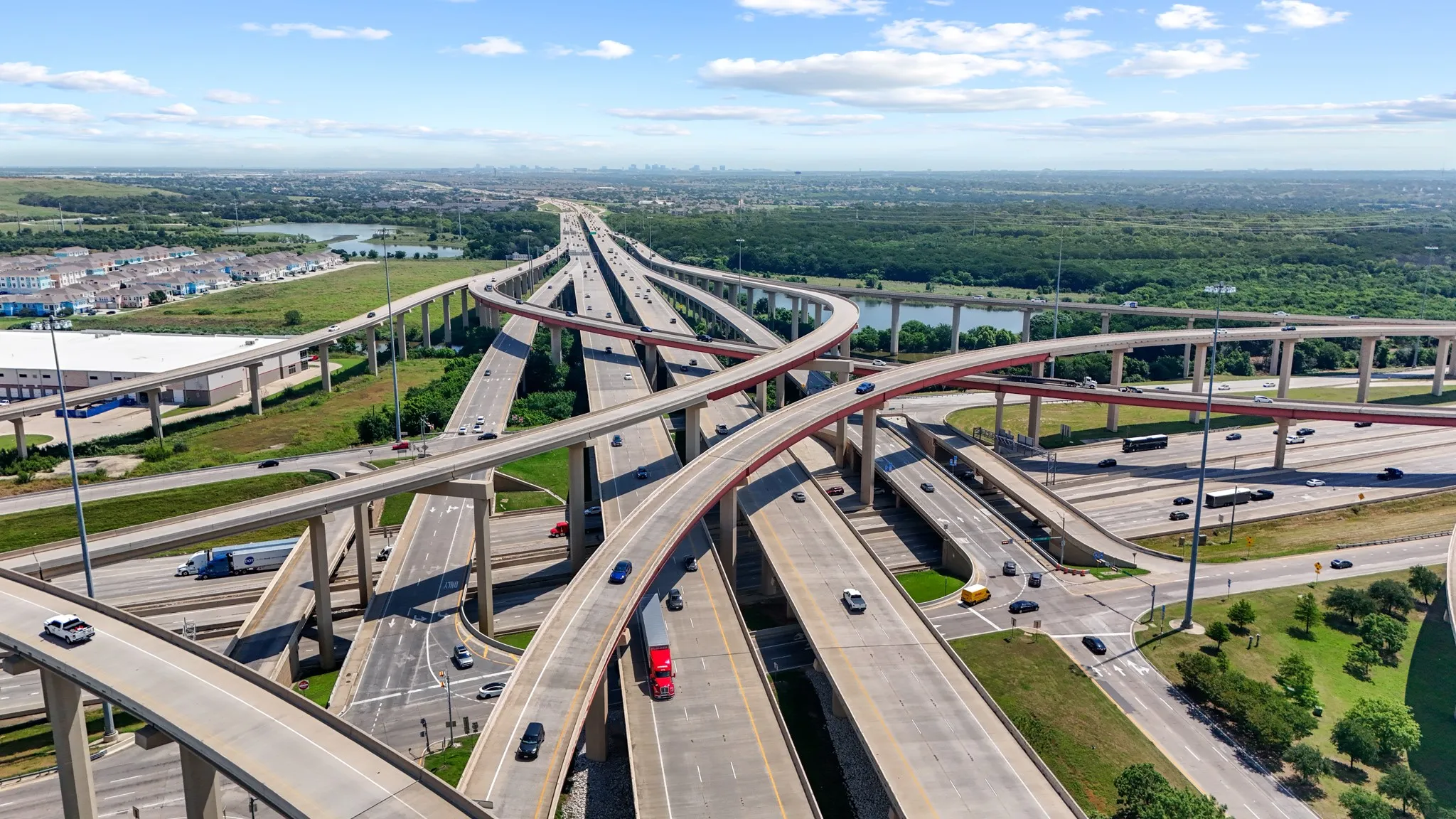 Aerial perspective highlighting the home's exceptional connectivity to Hwy 121, I-35E, and key DFW destinations including the airport, Costco, and premier retail. Location, location, location!