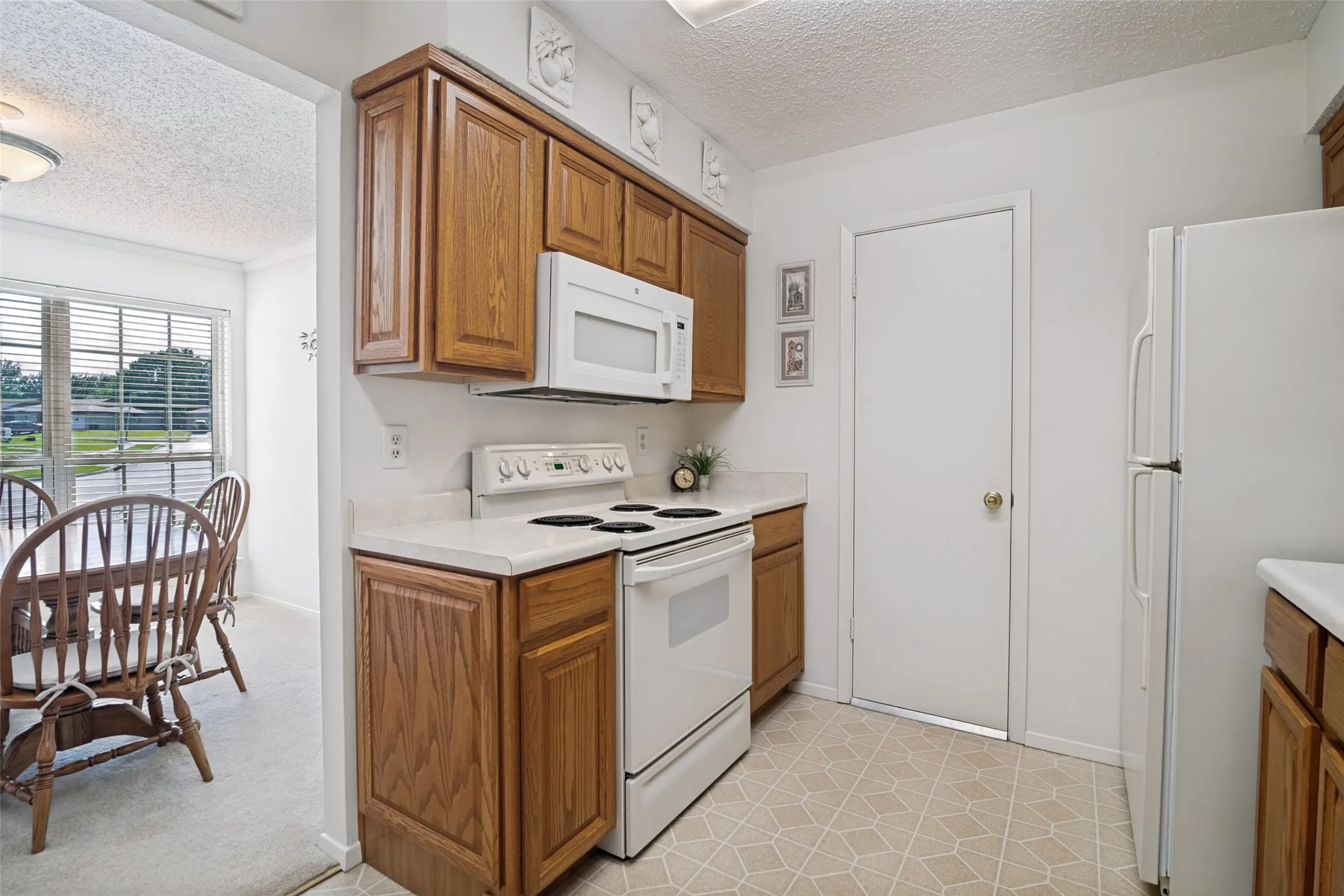 All appliances remain with the home making this kitchen ready for its next owner.