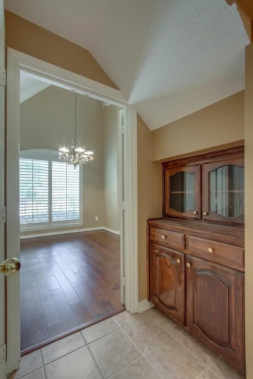 Kitchen looking out into Formal dining/living area