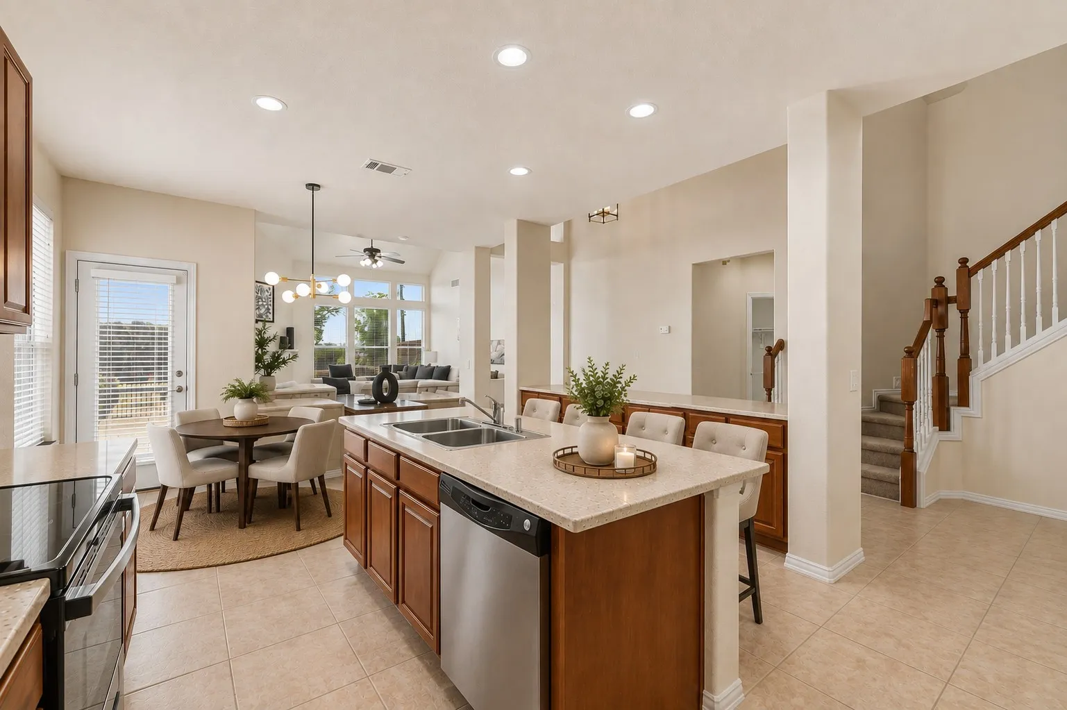 Kitchen island with built-in sink and stainless steel dishwasher