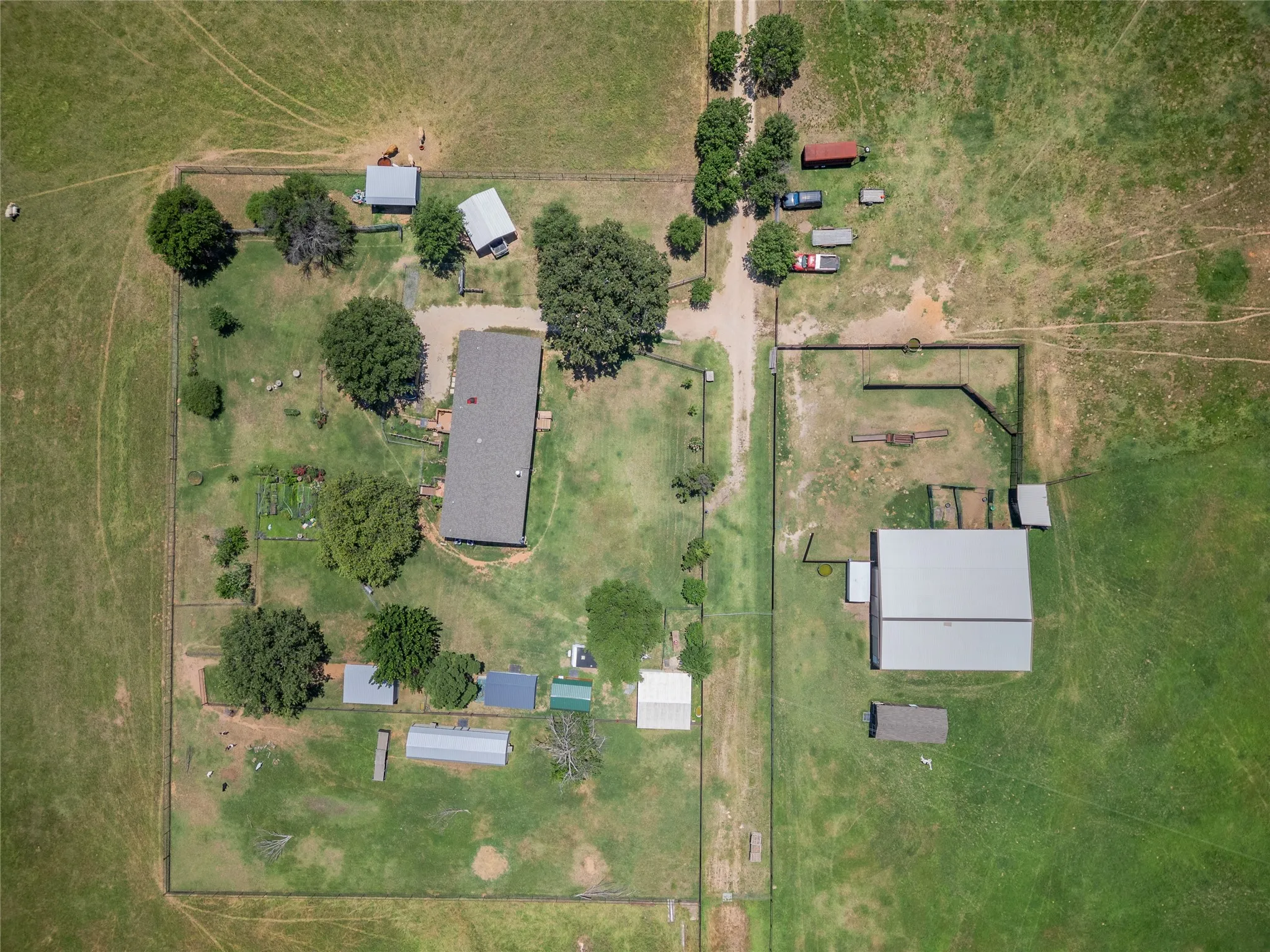 Existing improvements offer flexibility while planning your future custom ranch estate