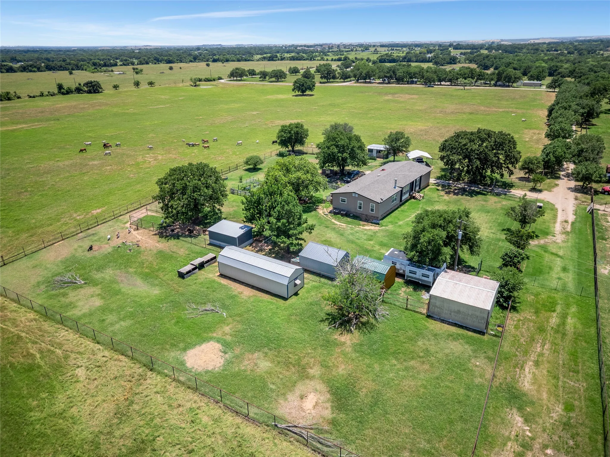 Currently running a cattle, goats and chickens. The living area has a piped non-climb fence surrounding the home.