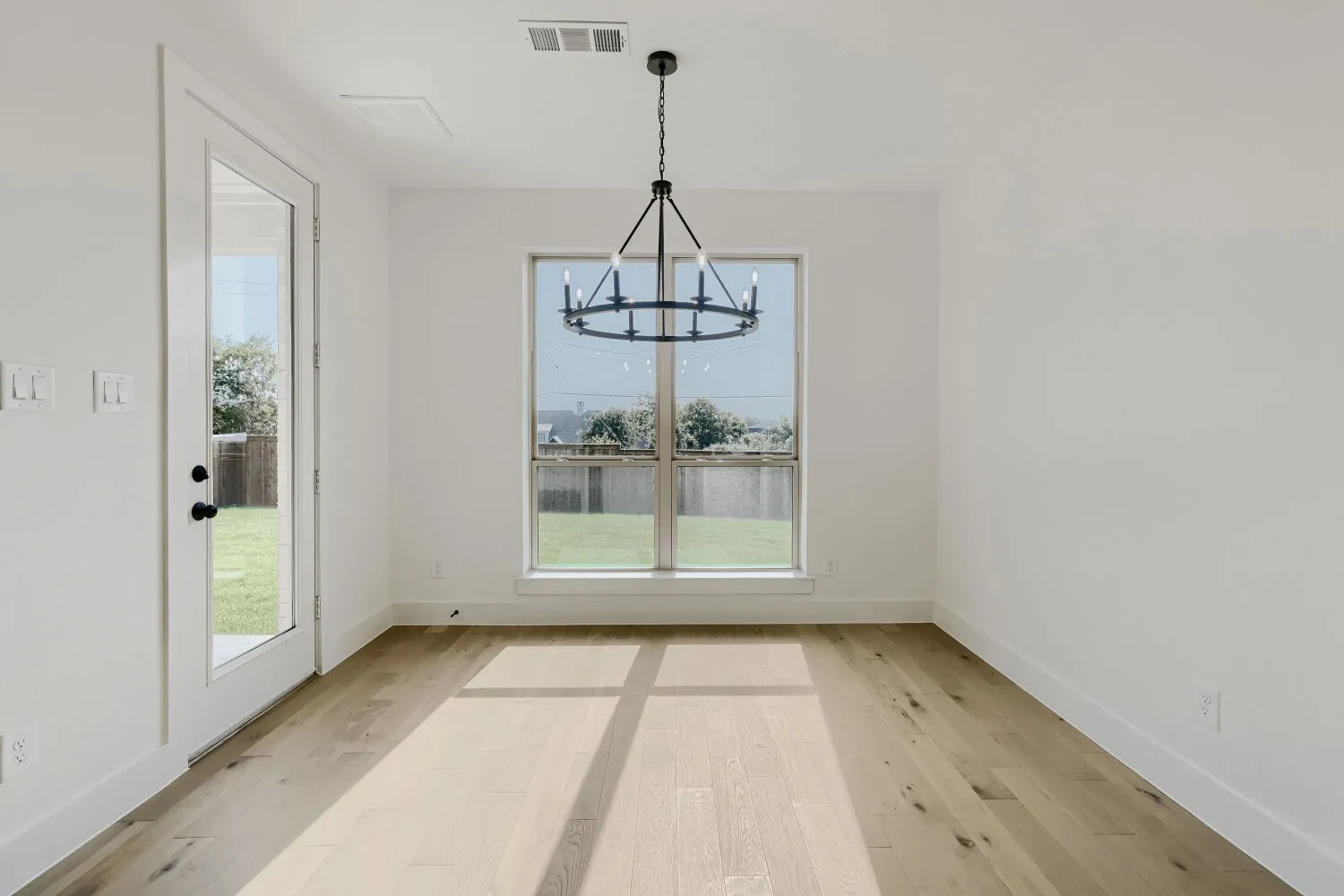 Wood-finish flooring with crisp white walls
