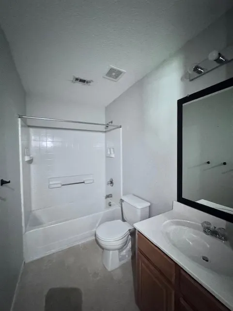 Carpeted room featuring light gray walls, a window with horizontal blinds, a ceiling fan with light fixture, and white trim