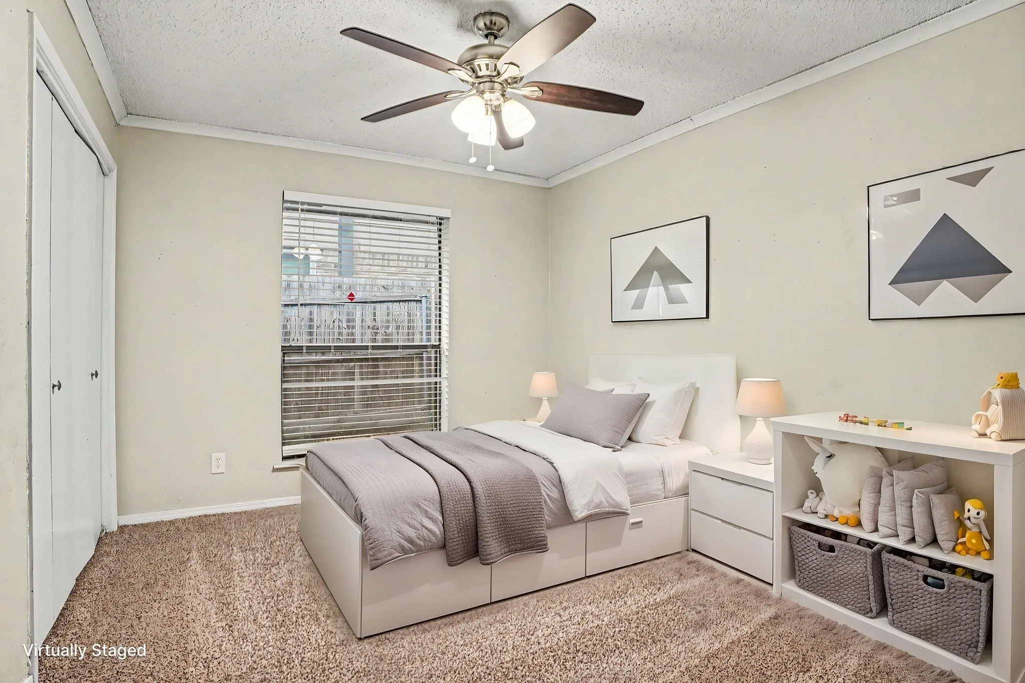 Bedroom #4 by the front entrance. Versatile room may be used as an office/study room.