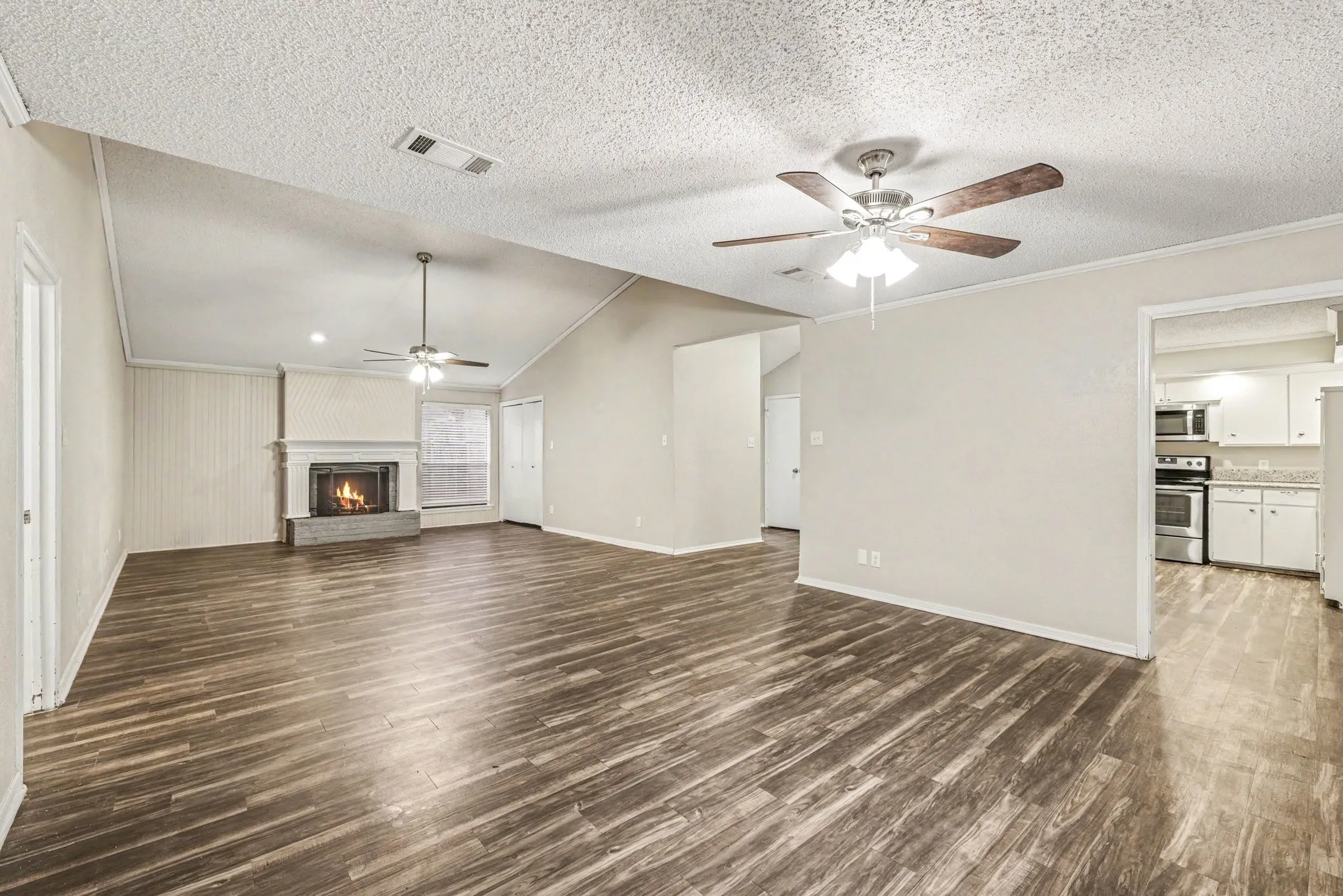 Large room view from dining area into the living room.