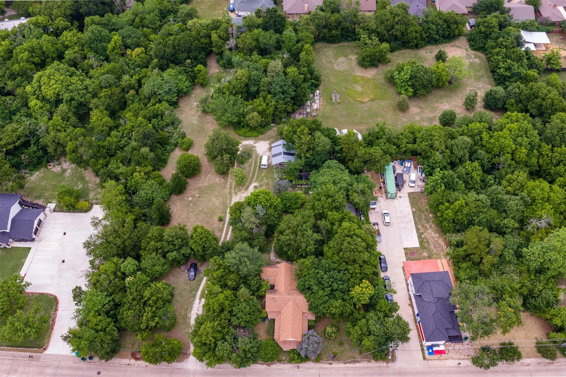 Expansive wooded parcel featuring a mix of mature trees and cleared areas