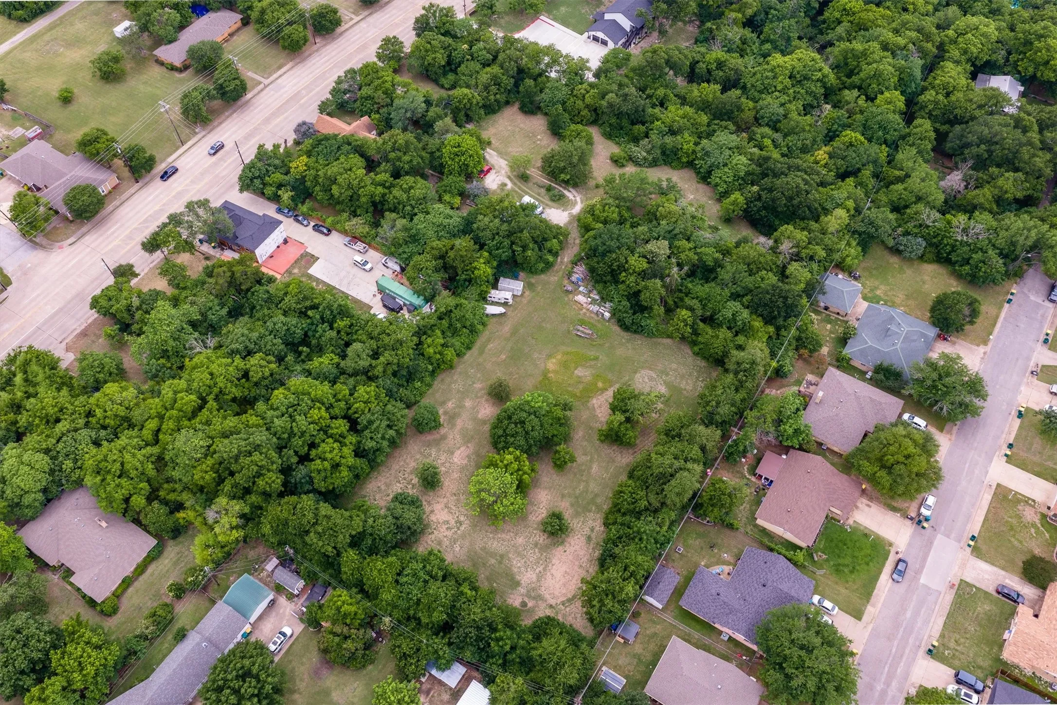 Expansive parcel featuring a mix of mature trees and open clearings