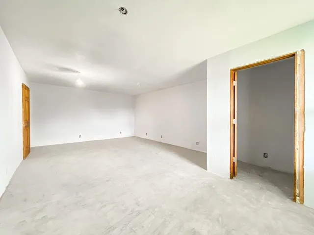 This room is currently a bedroom but can be a gun safe room as well. Vault door still on premise and will convey. fireproof and secured with quarter in steel plate top to bottom and inside walls, plate to close off window as well