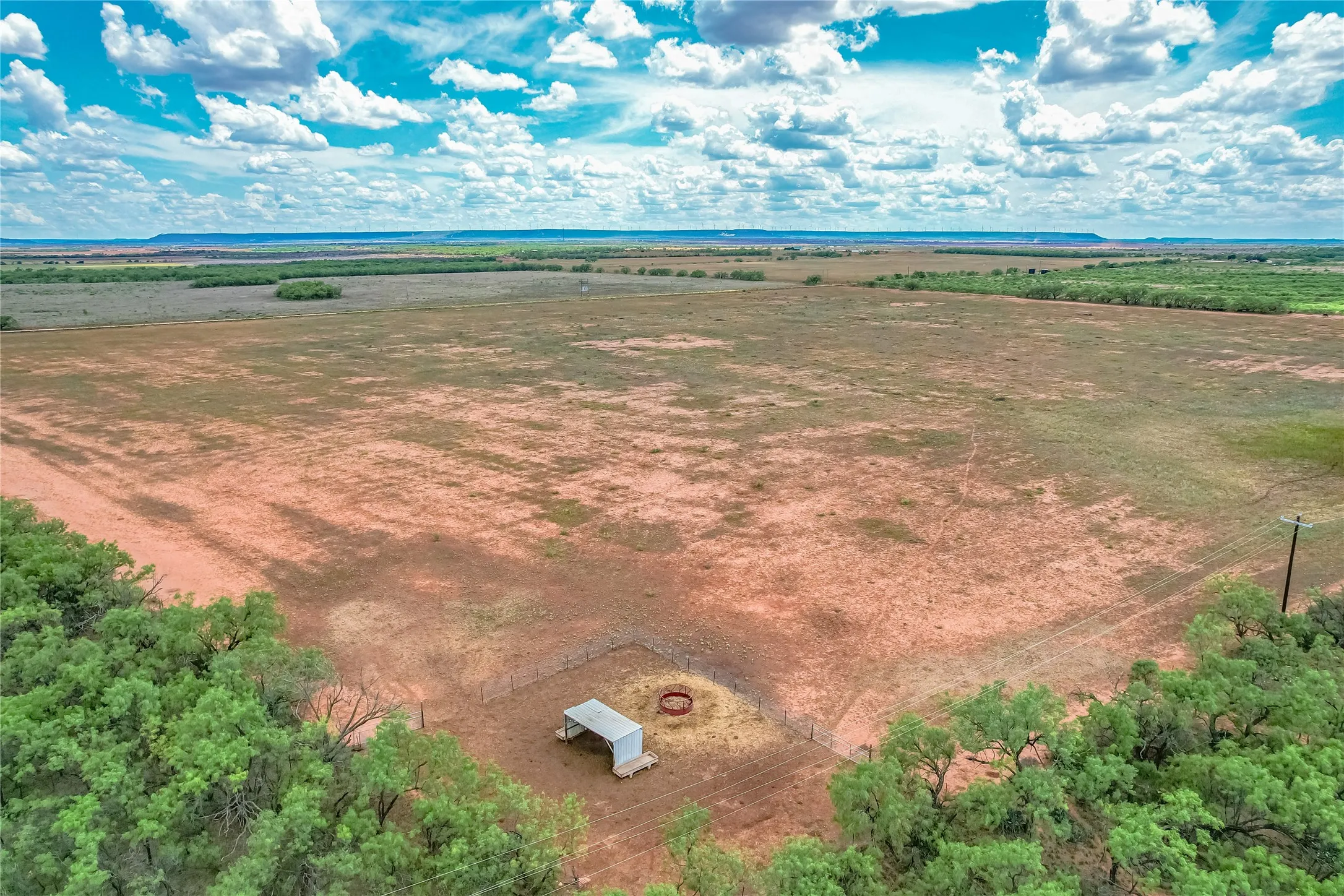 50 acres of Pasture including catch pin and loafing shed where cows are brought to at night with a water trough with auto fill.