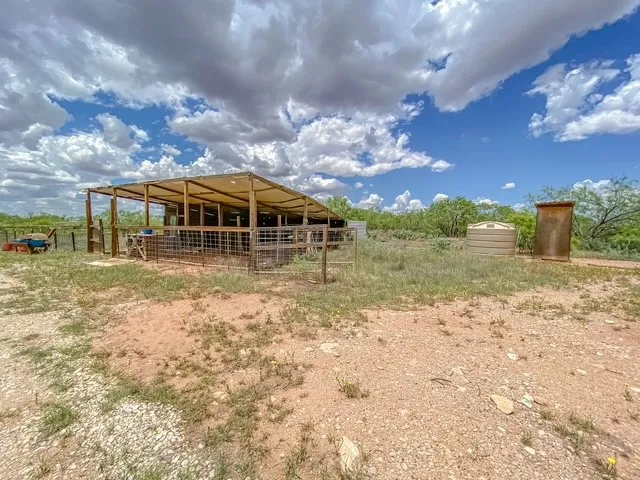 Pig Barn, chicken coop, well 120 ft deep, brand new pump onsite ready to go in, 1500 gallon tank, 12 gal per minute,  well house is all solar, lift and pressure pump can feed entire property, water line runs 300yrds to pasture. 3 pig stalls have water nipples, chicken coop has auto-fill in water bowl.