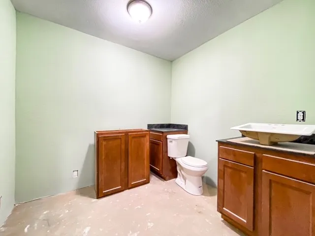  Currently  a half bath but can be a full bath, cabinet is installed, rest are just placed for pictures