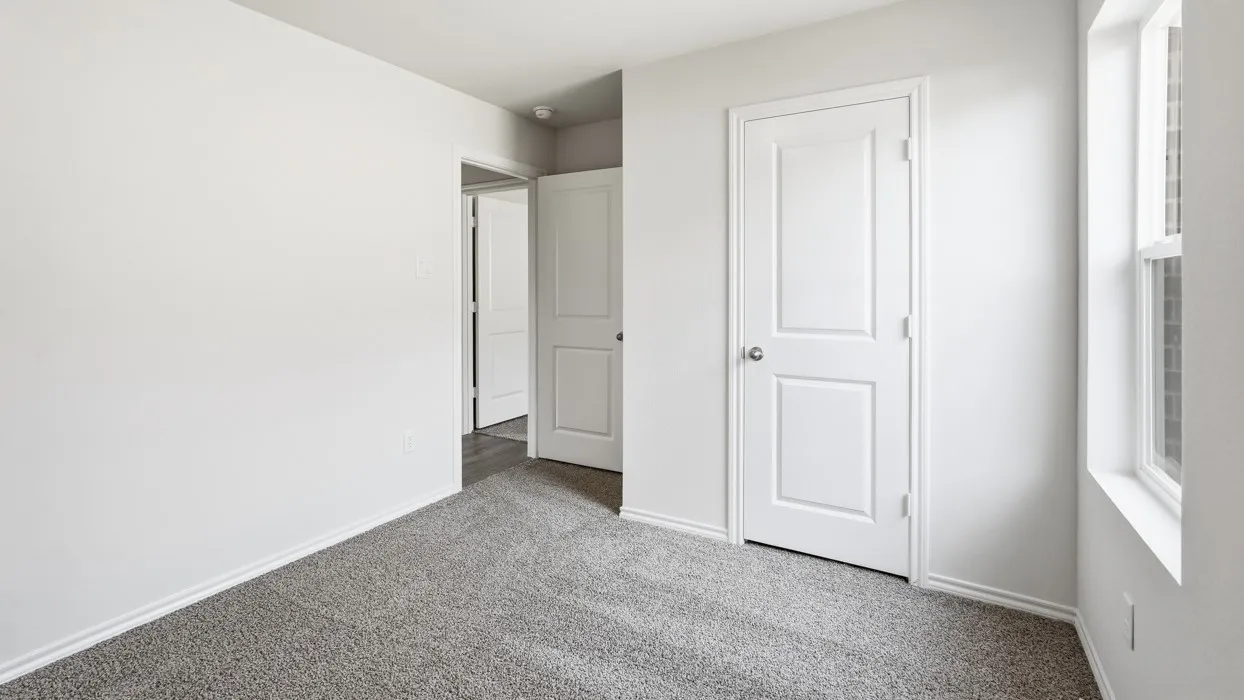 Light gray carpeting paired with white walls