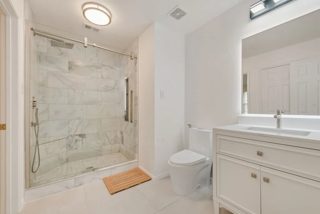 Separate view of upstairs full bath on 2nd level, very nice walk in shower.