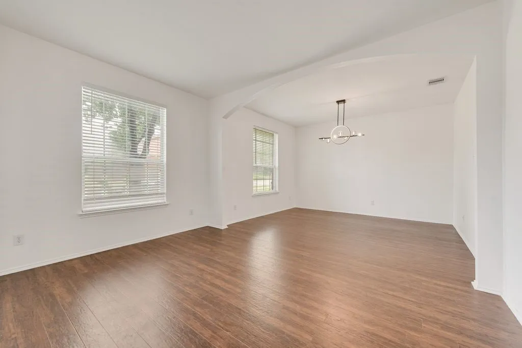 View from foyer of the formal dining and living room area.