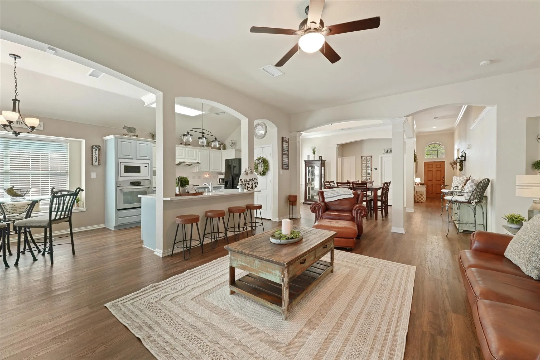 From the living room, enjoy clear sightlines into the kitchen and breakfast nook. This layout keeps everyone connected whether you're preparing meals, entertaining guests, or enjoying a quiet evening at home.