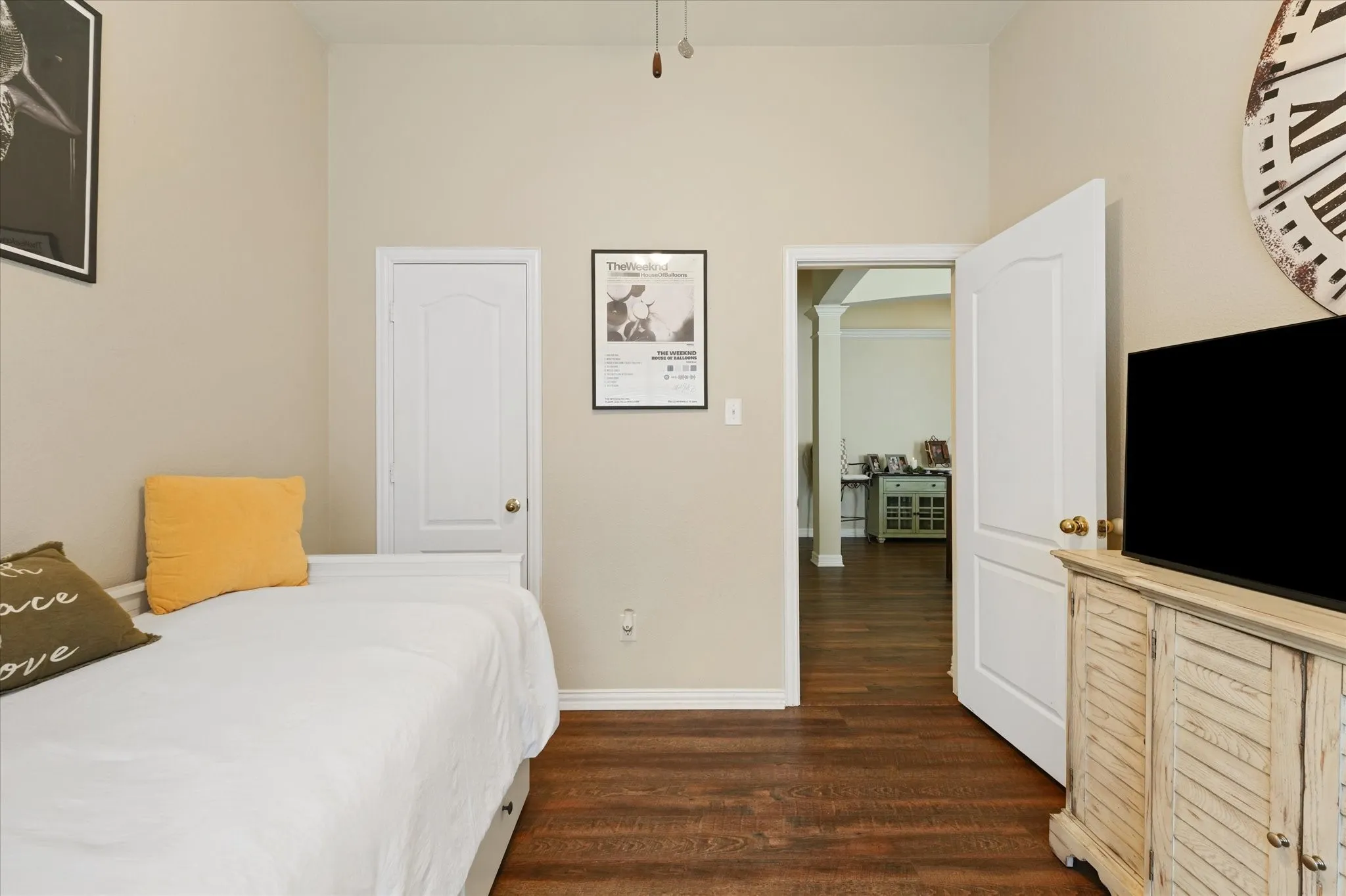 Generously sized bedroom with ample wall space, updated flooring, and easy access to the nearby full bathroom. Consistent flooring throughout the home creates a clean, cohesive look.