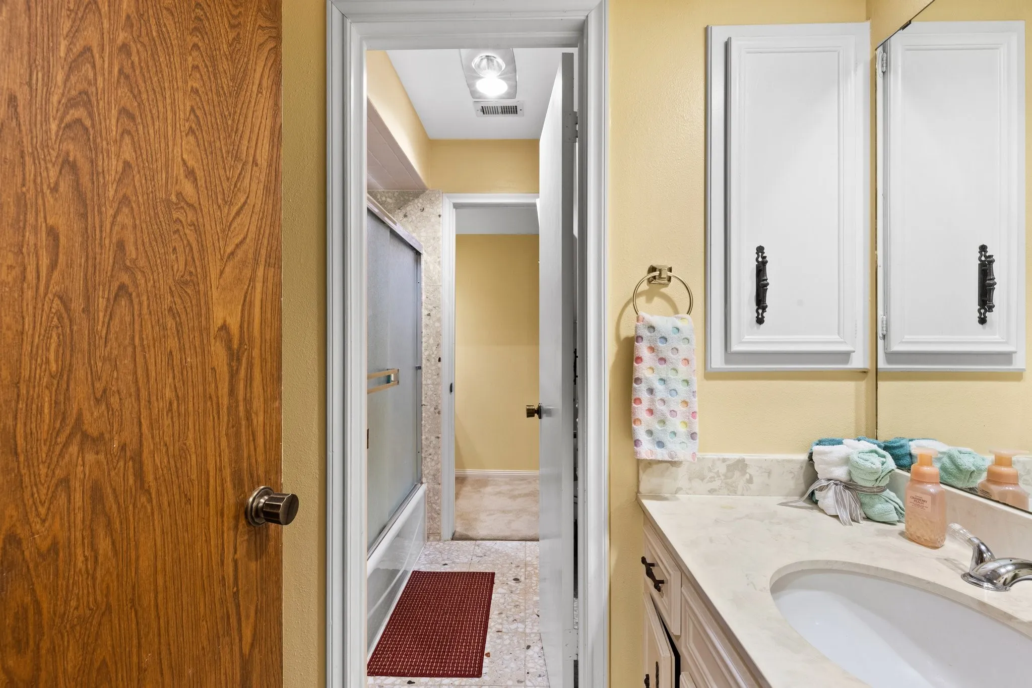Hallway access to upstairs Bath