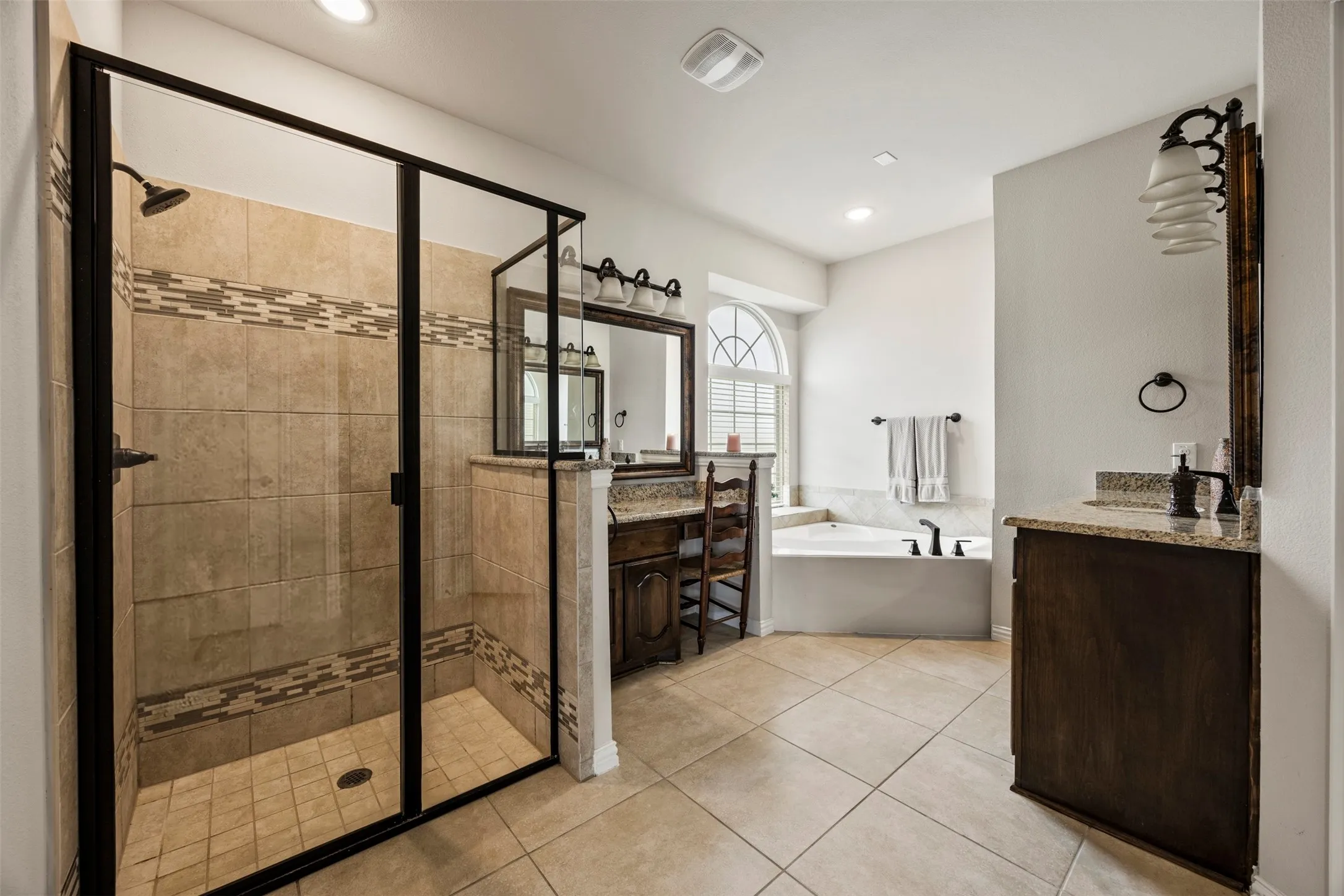 Walk-in shower and separate bathtub with walk in closet