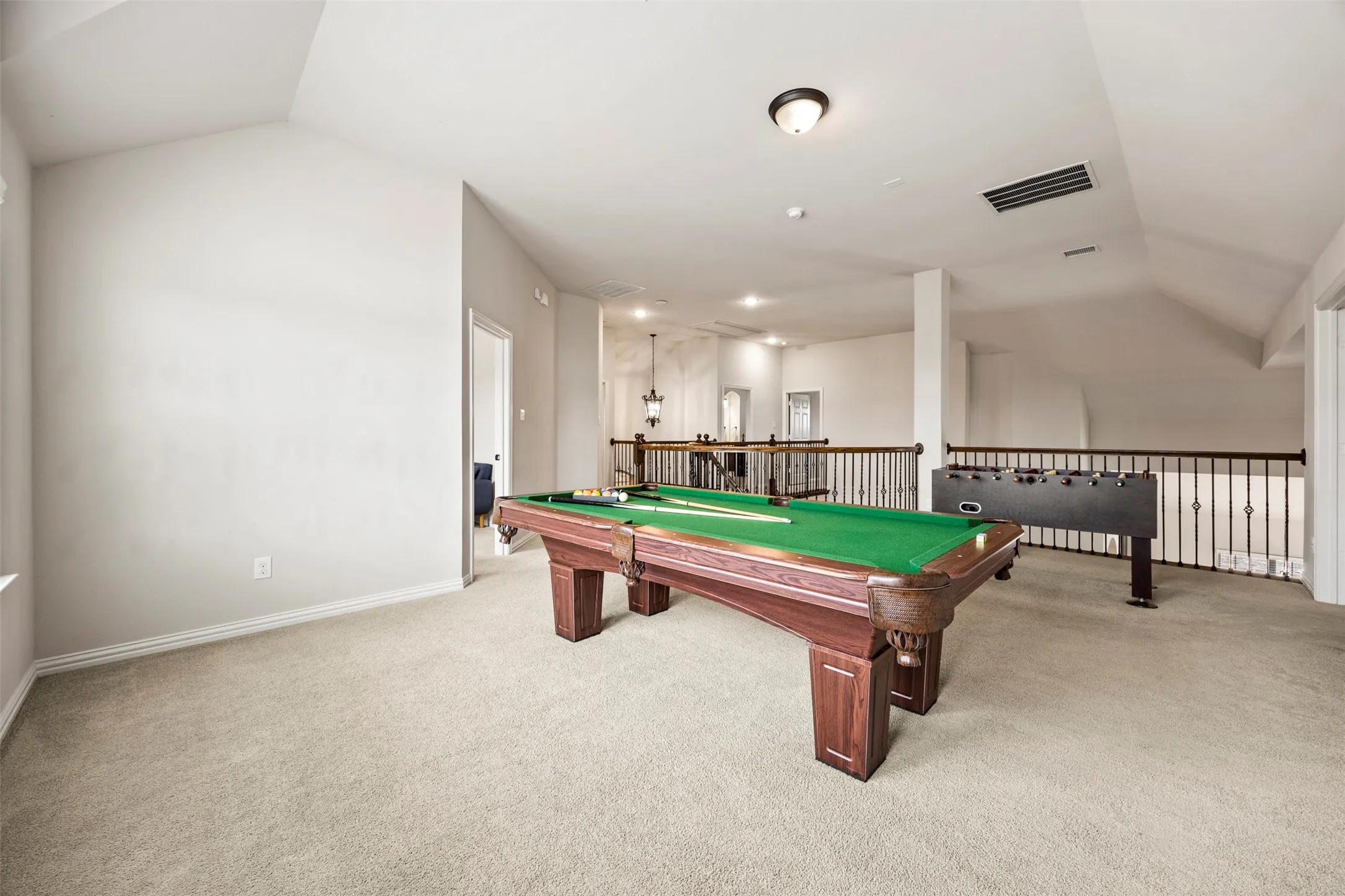 This space doubles as a Game Room, 2nd Living Room, Exercise Area, or Flex Space