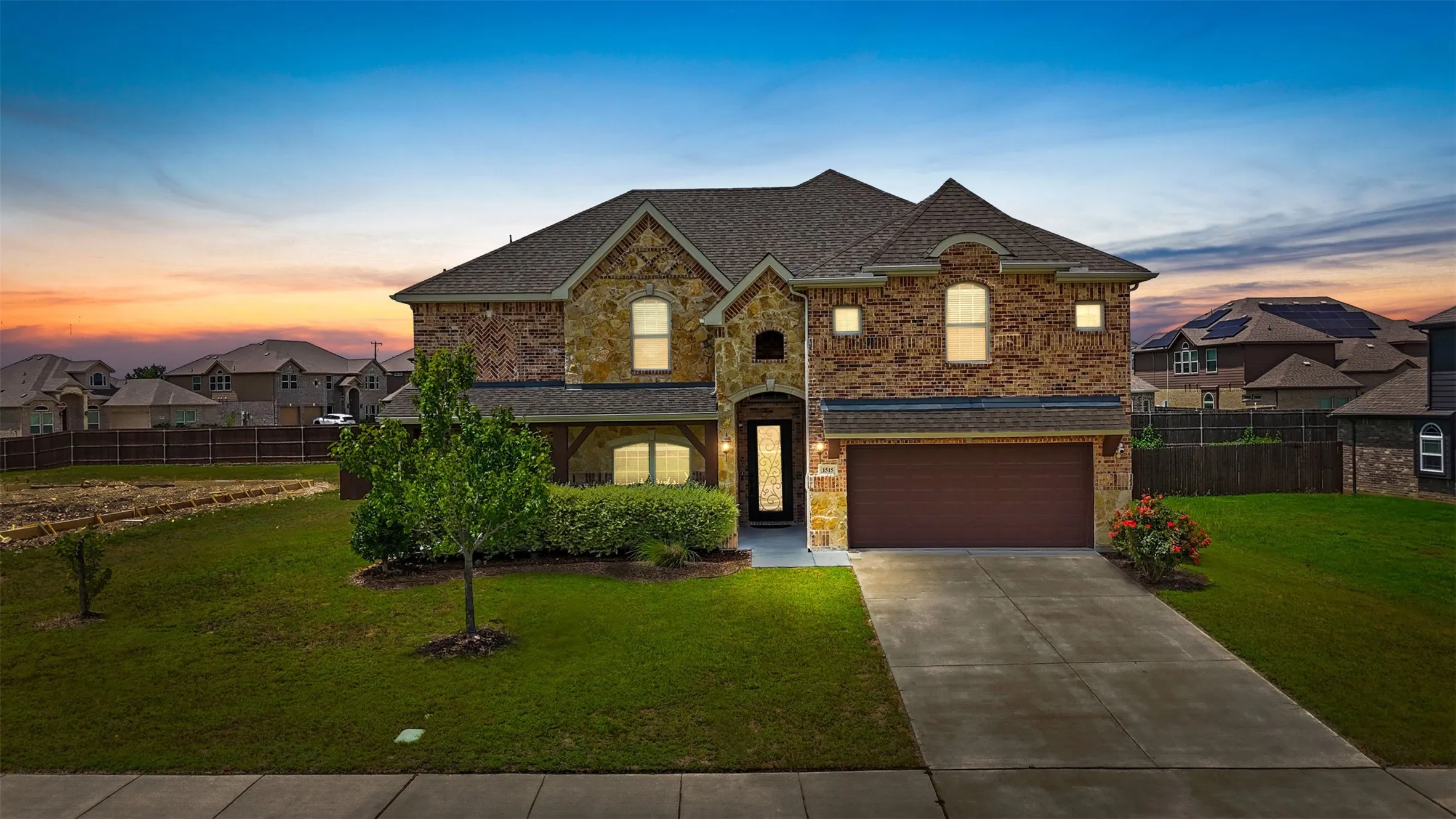 Twilight view of this masterpiece of a home