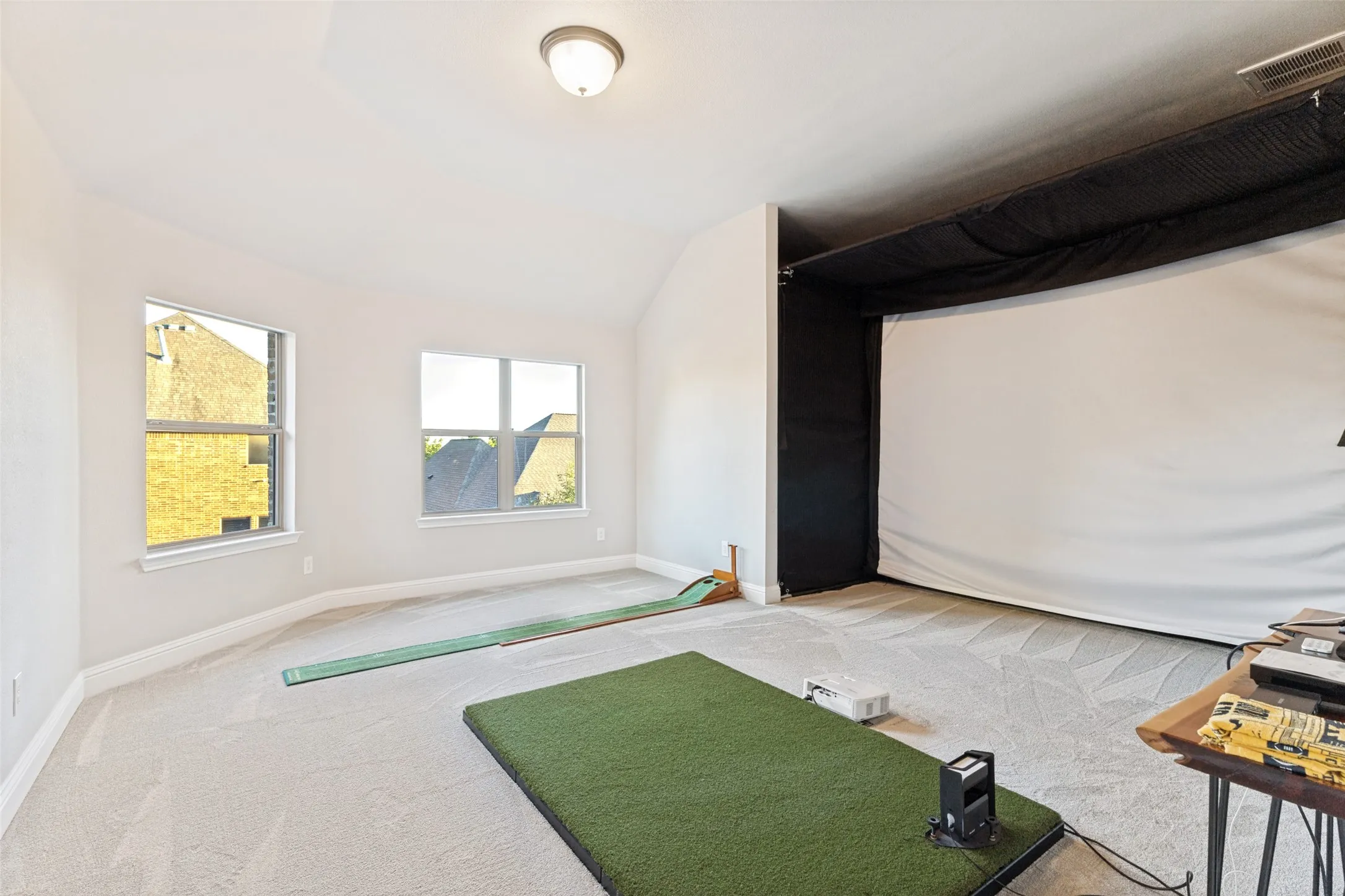 Golf simulator currently in game room