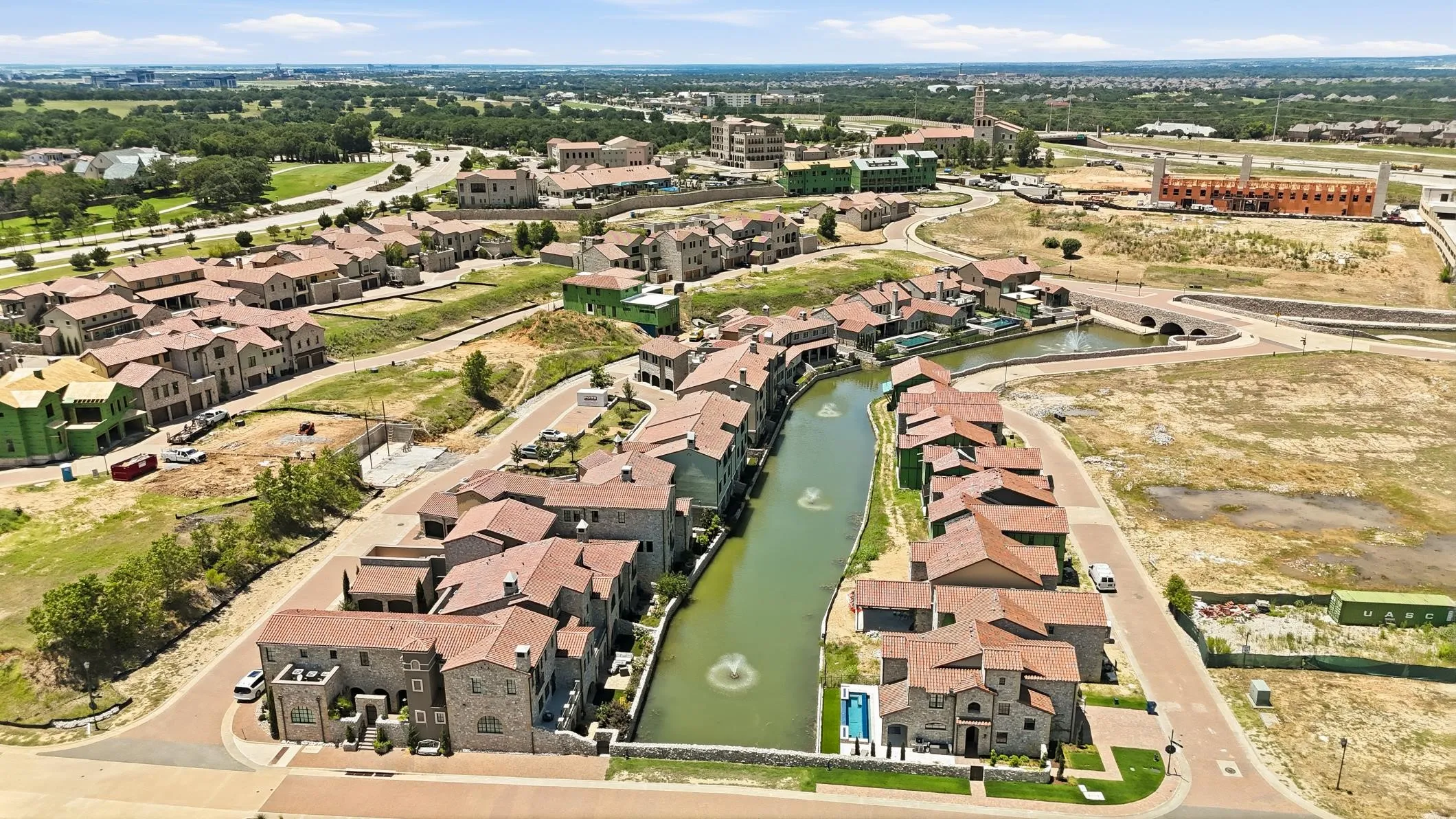 A breathtaking aerial view of Entrada's iconic canals, luxury homes, charming bridges, and European-inspired architecture, showcasing one of Westlake's most sought-after communities.