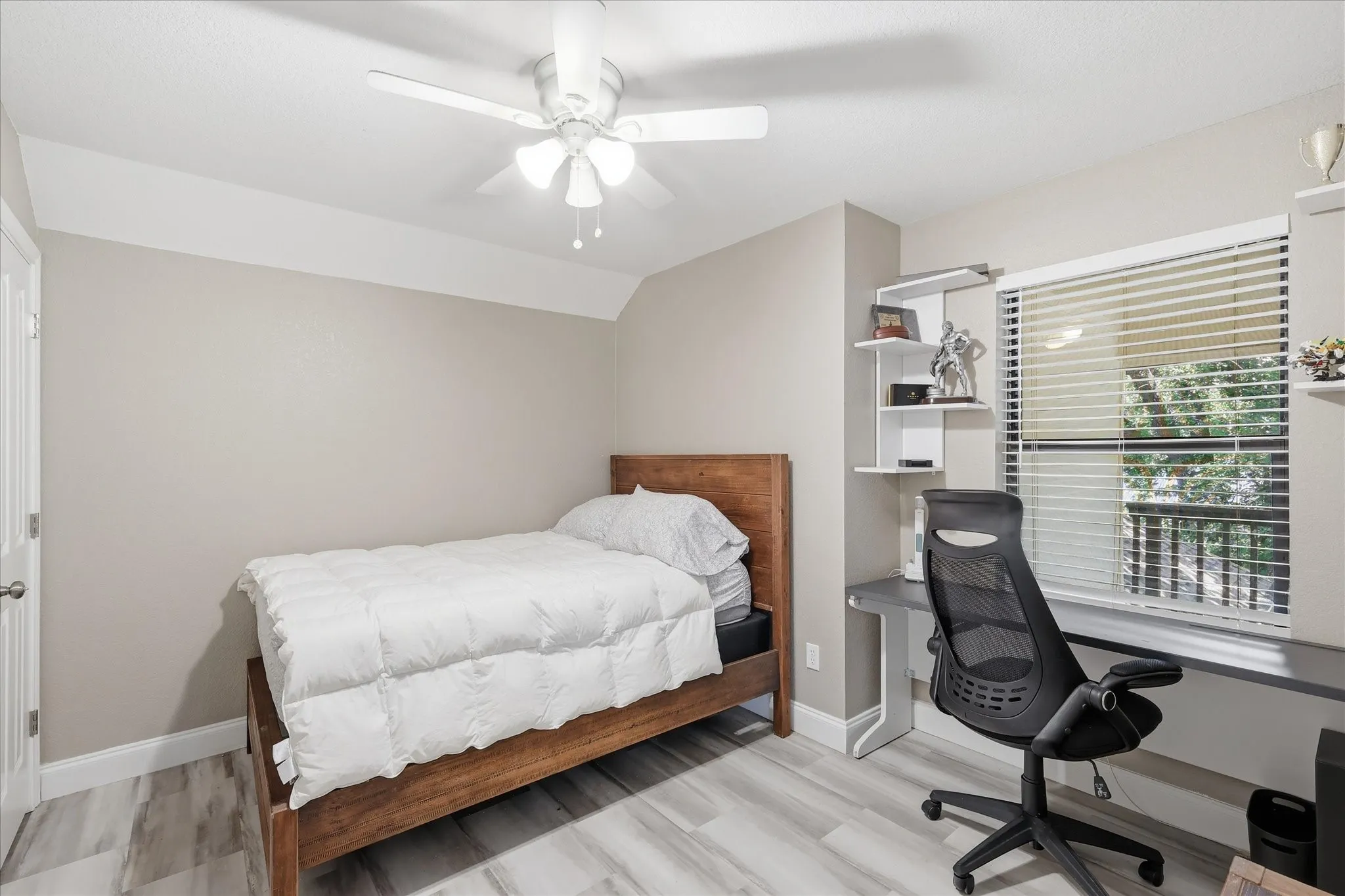 Upstairs Bedroom with full bath, living room with wet bar and private covered patio overlooking pool